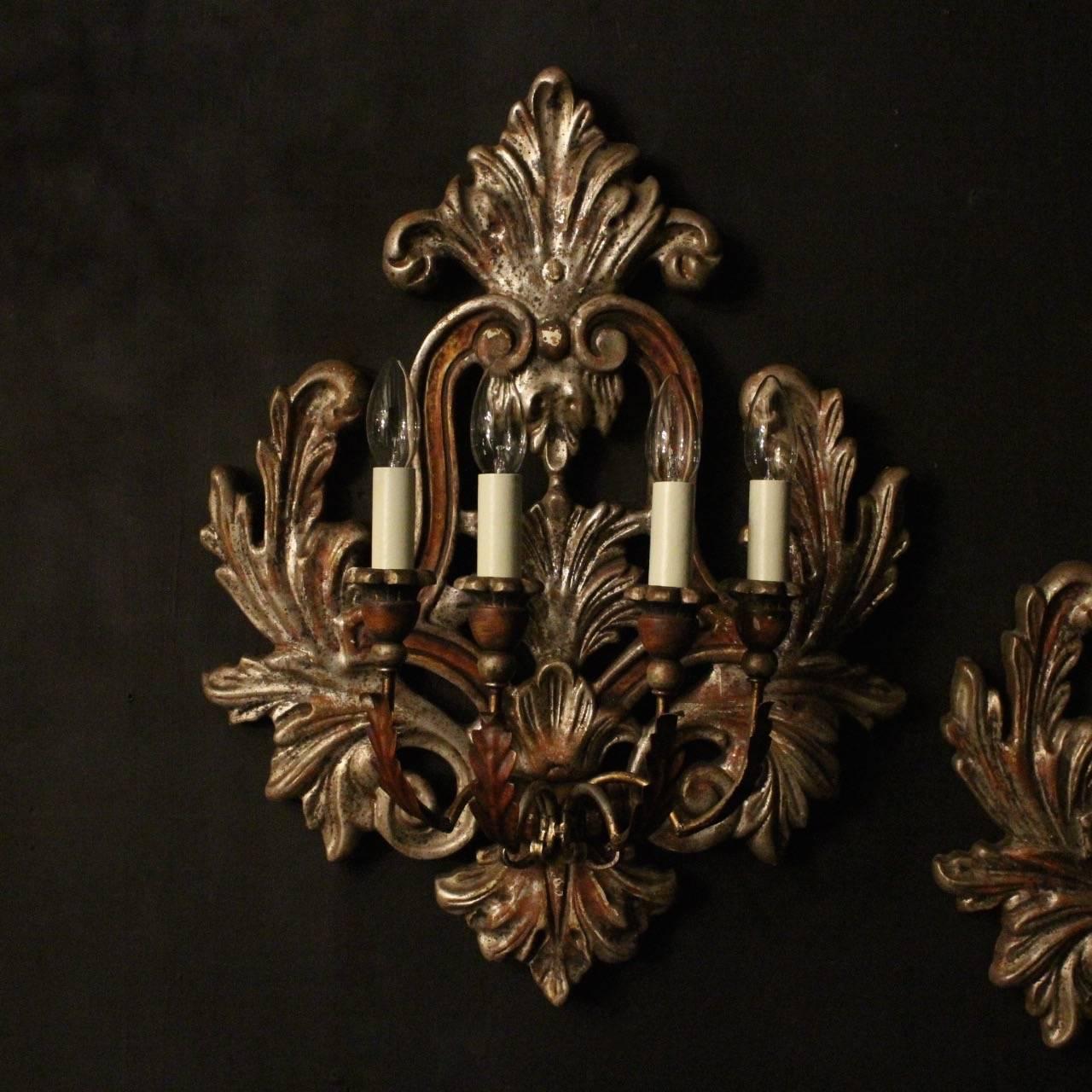 A decorative Italian carved giltwood and toleware four arm wall lights, the foliated toleware leaf scrolling arms with wooden bulbous candle sconces, issuing from an ornate pierced Acanthus leaf silvered wooden backplate, very decorative, nice