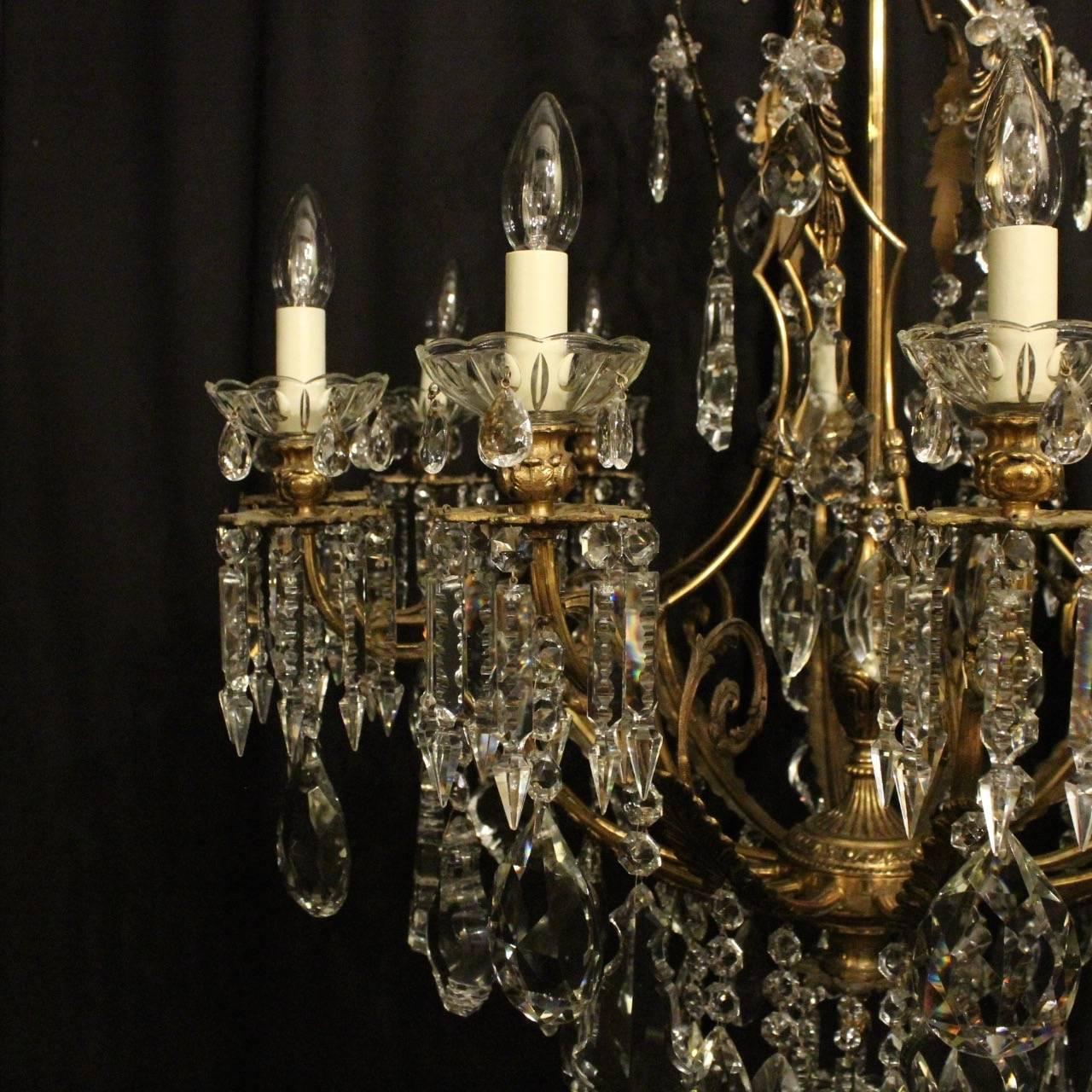 Early 20th Century French Gilded Bronze and Crystal Twelve-Light Chandelier