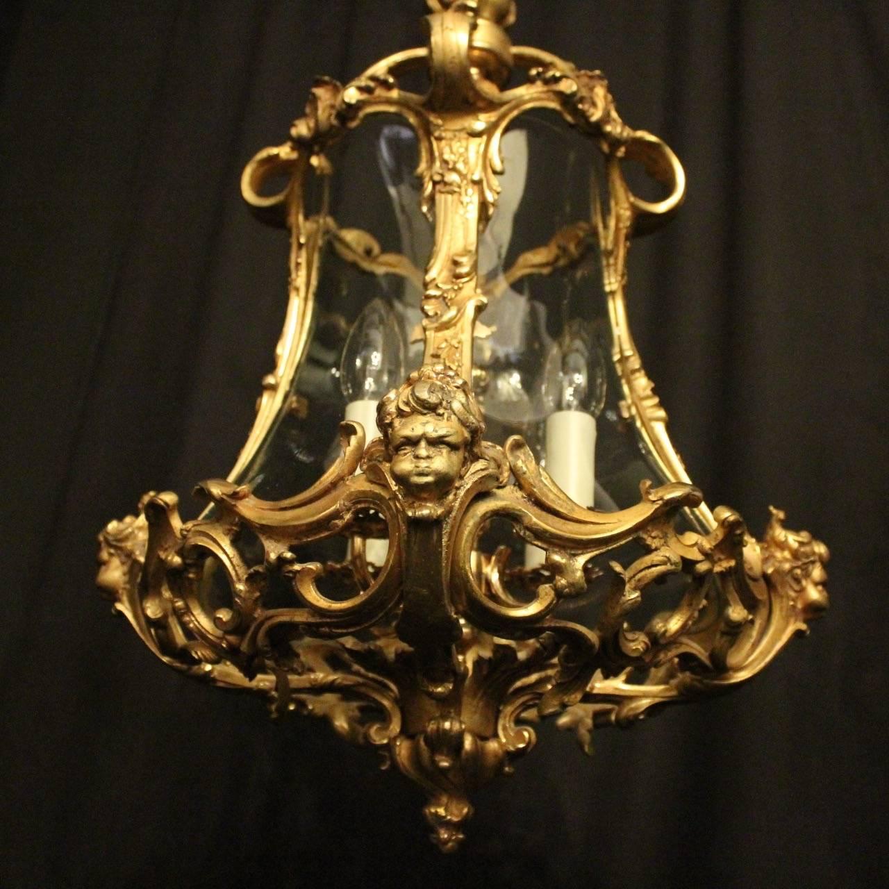 Gilt Italian Pair of Four-Light Gilded Bronze Cherub Lanterns