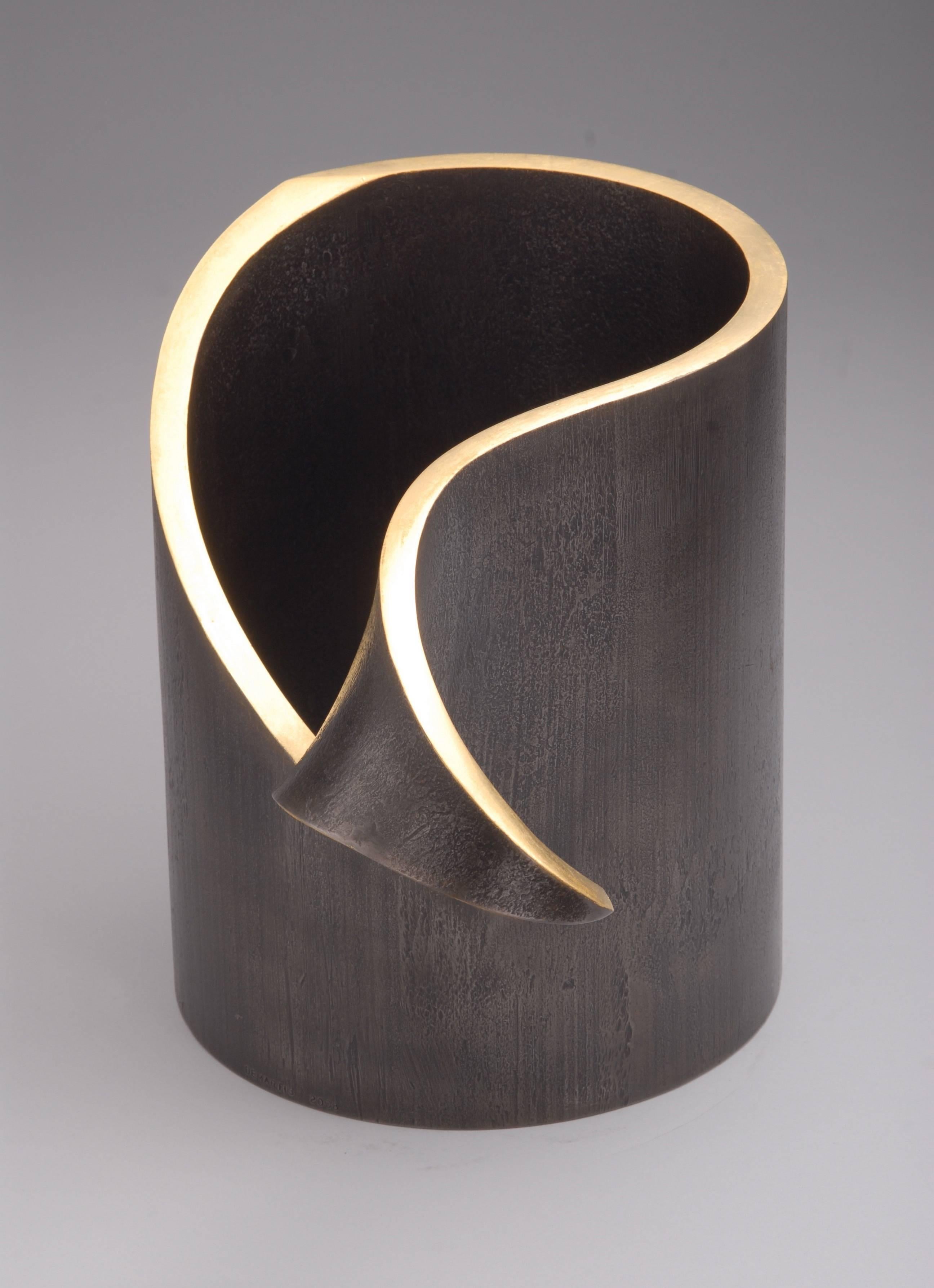 Peel MeSculpture en acier avec feuille d'or 23 carats.