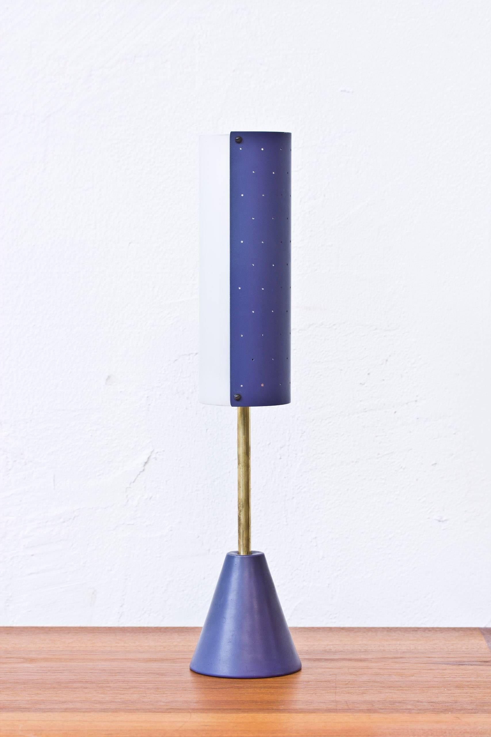 Brass, acrylic and blue lacquered metal lamp designed by Svend Aage Holm Sorensen. Produced by ASEA in the 1950s. Very good original condition. Light switch on chord.