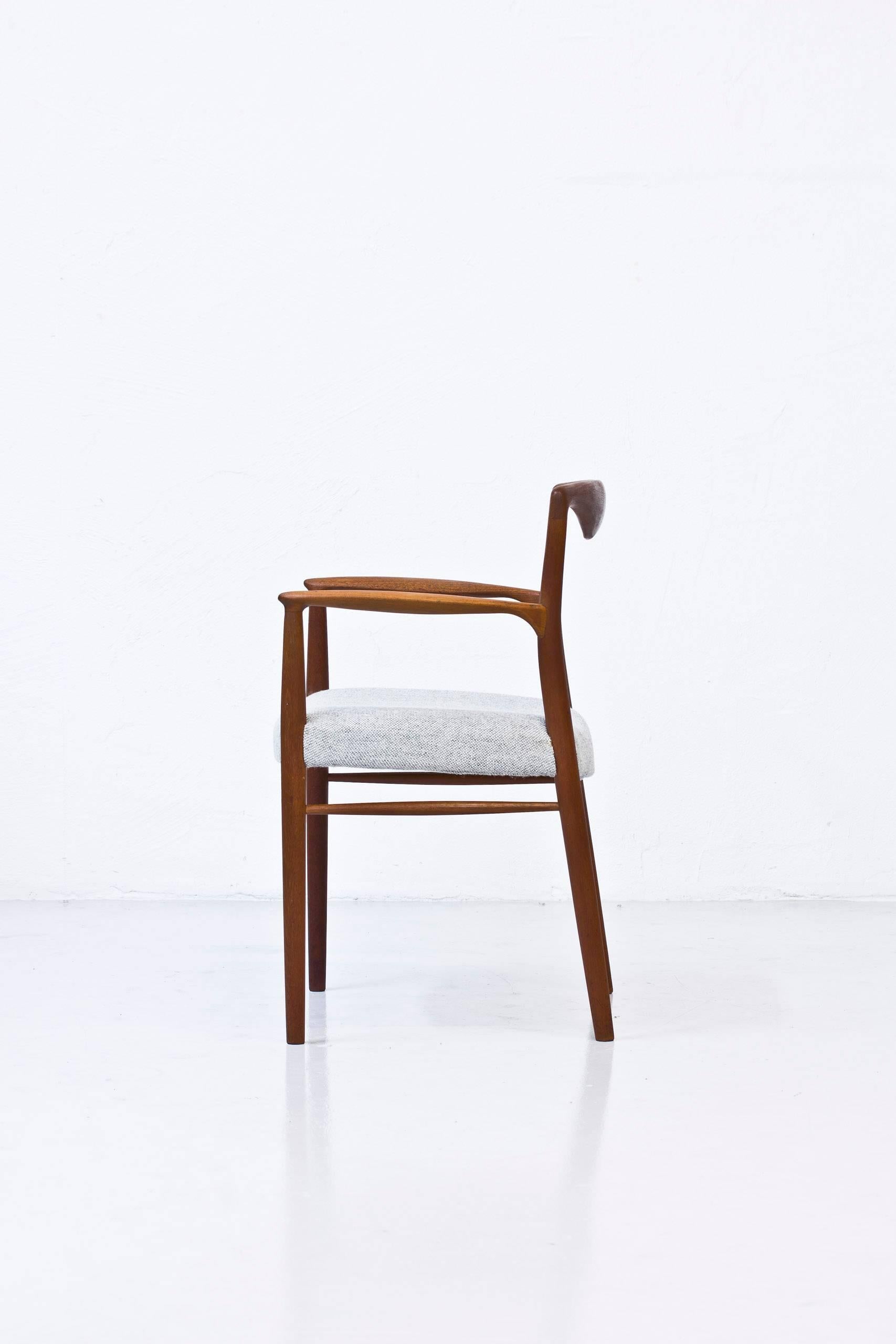 Armchair designed by Kai Lyngfeldt Larsen during the 1950s. Produced by Soren Willadsen in Denmark. Solid teak frame with new Hallingdal fabric from Kvadrat textiles. Excellent condition with small traces of wear and age related use to the frame.
  