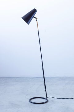 Mid century floor lamp with cane handle by Eje Ahlgren for LUCO, Sweden 1950s