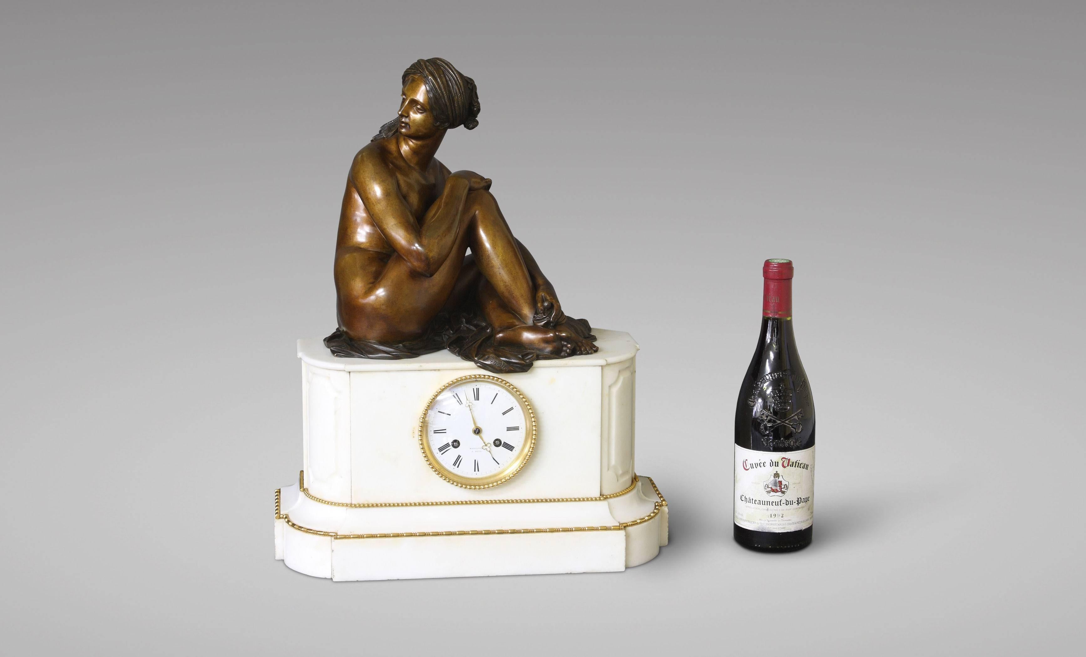 Mid-19th Century White Marble Clock with a Bronze Statue of an 