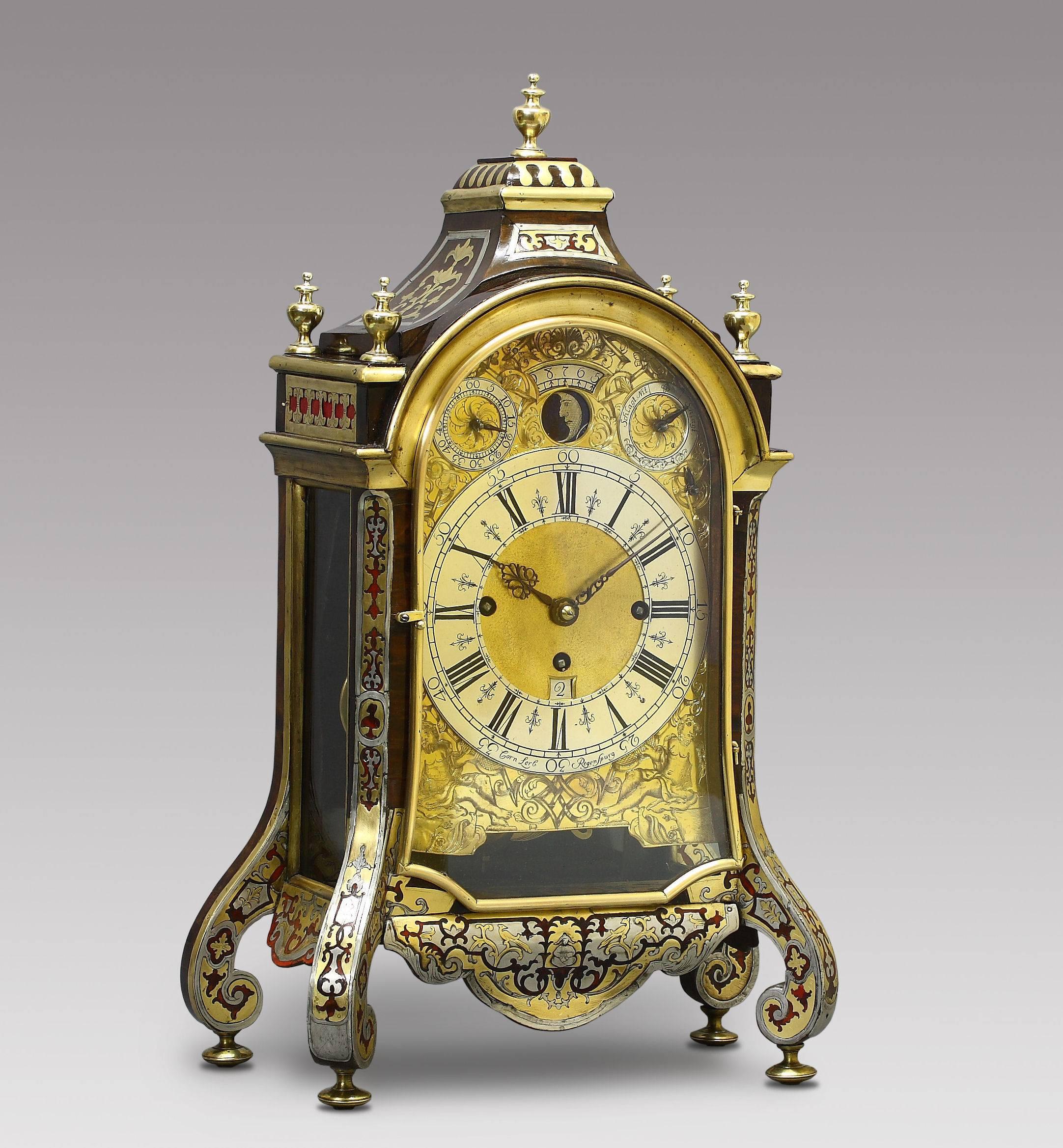 German table clock, signed corn Lerb Regenspurg, circa 1740 (Cornelius Lerb, 1706-after 1750).
Three-train movement, on the left for the hour strike, in the center for the time and on the right for the quarter-chime, chiming the four quarters on