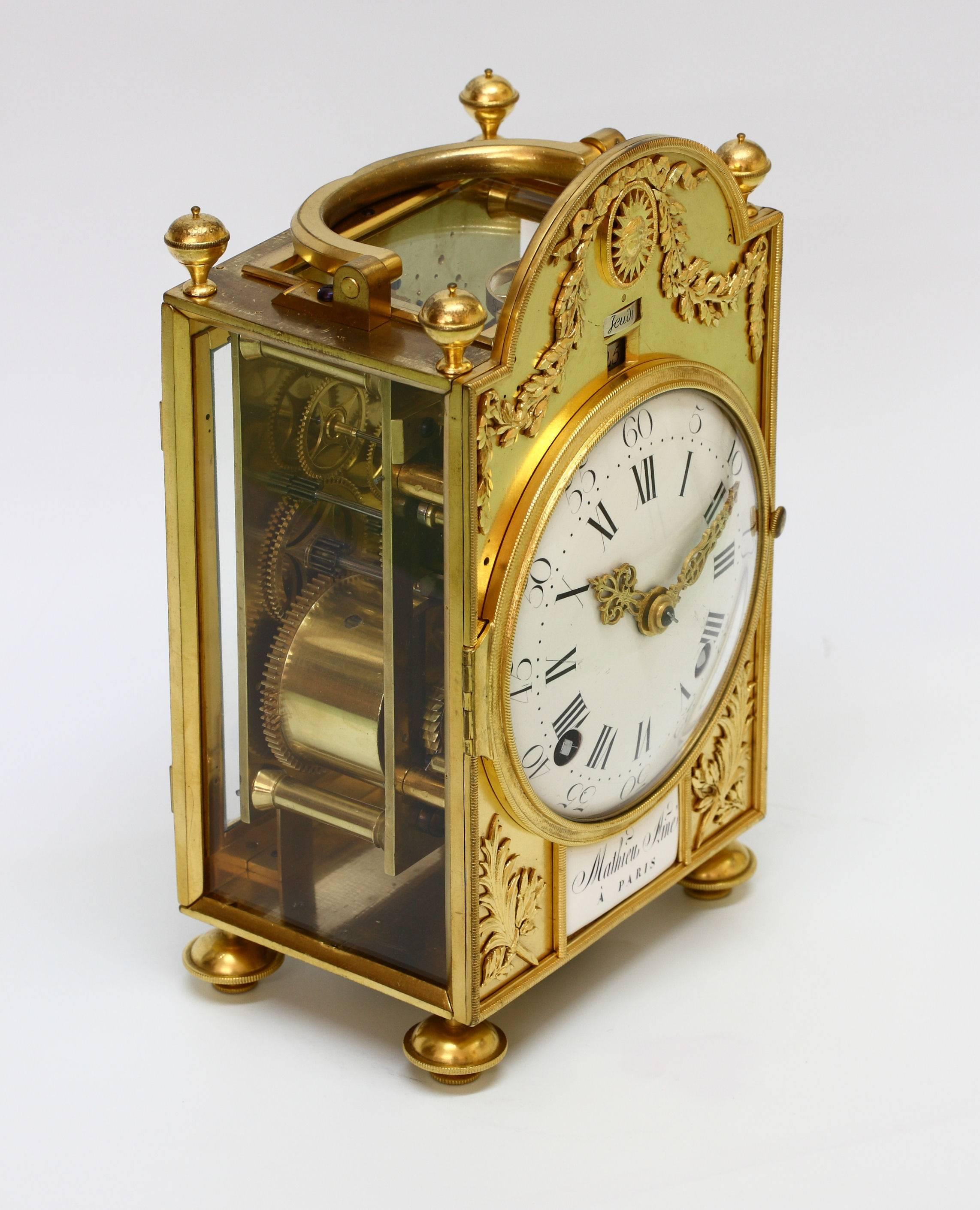Small portable table clock signed Mathieu l'Aîné A Paris, and dated 1776. Eight day duration rectangular movement with two simplified Maltese crosses on the barrels. Rack strike for the hours and half hours on a silvered bell situated below. Later