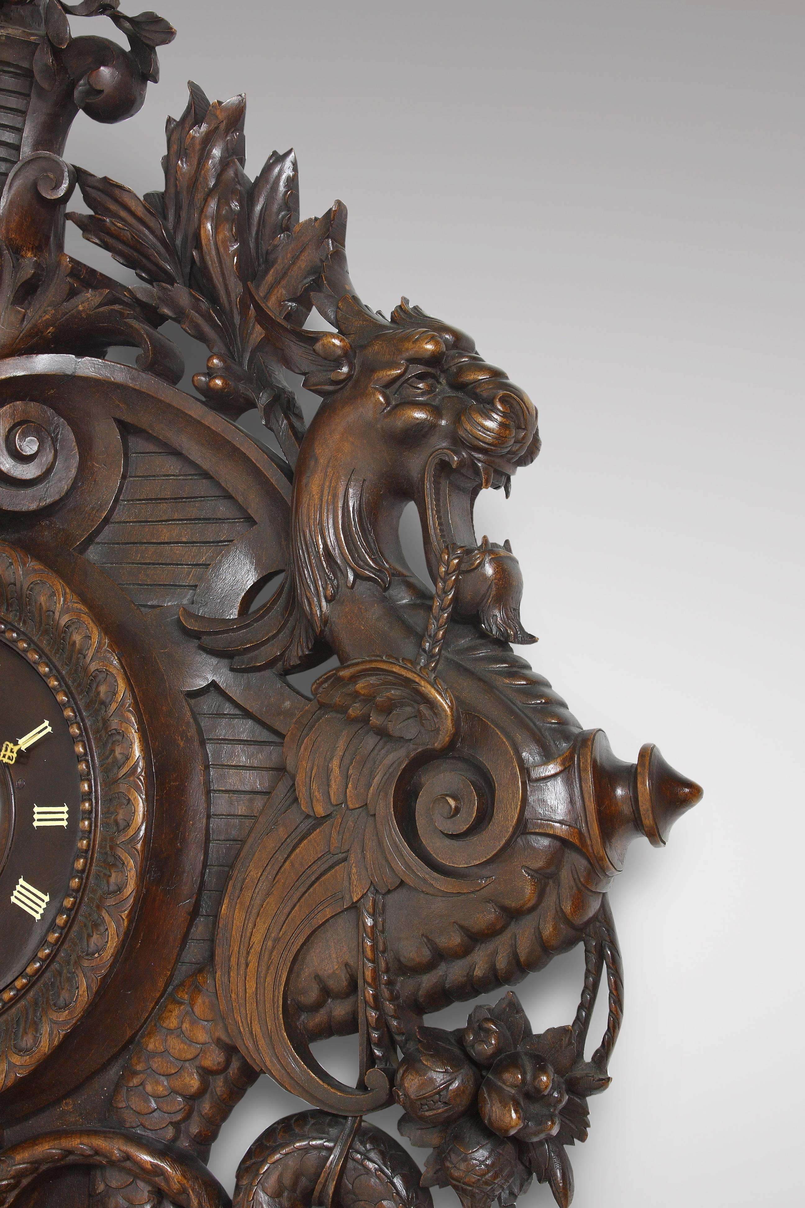 Baroque Revival Very Large and Exceptional Carved Walnut Wall Clock with Imaginary Monsters For Sale