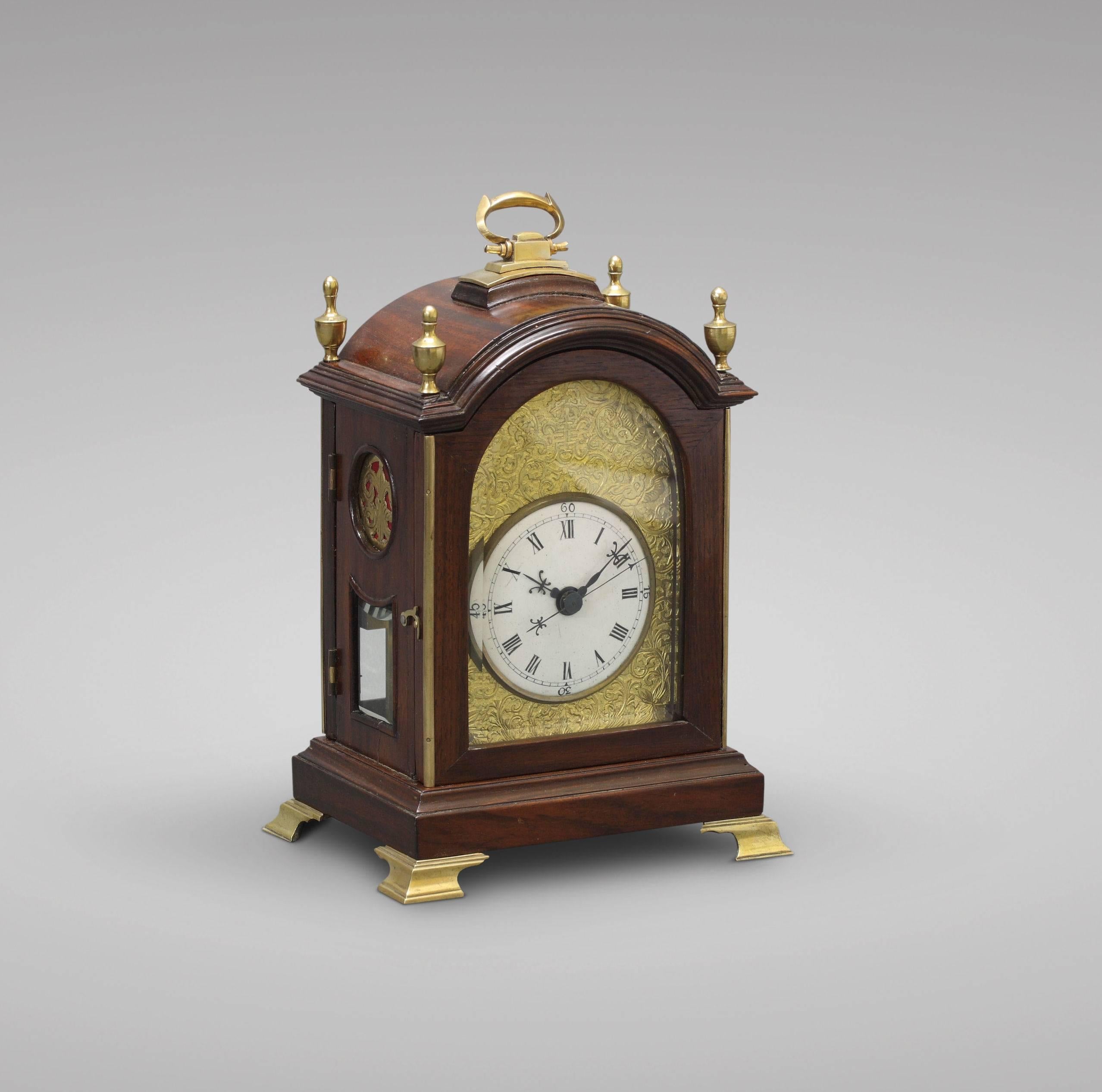 Small Chinese bracket clock for the export market, first half of the 19th century.

Twin-barreled square movement, verge escapement with suspension pivoted at the front and knife-edged at the rear. Hands setting through an ingenious spring-loaded
