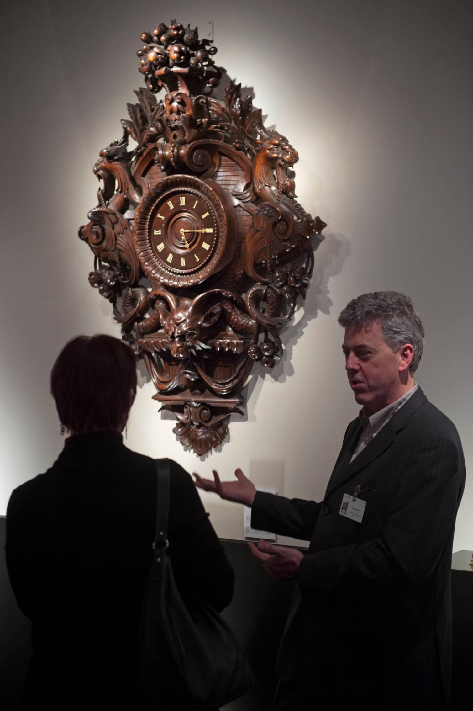 Very Large and Exceptional Carved Walnut Wall Clock with Imaginary Monsters For Sale 1