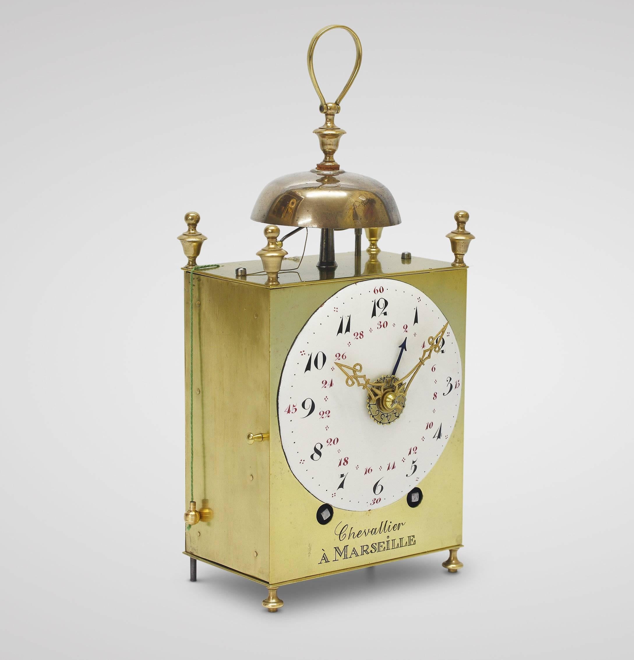 Directoire-period French Capucine clock, circa 1795, signed Chevallier à Marseille. Enamel dial with Arabic black numerals for the hours, red for the 15 minutes and red for the 30-day calendar, engraved signature Chevallier à Marseille below. Double