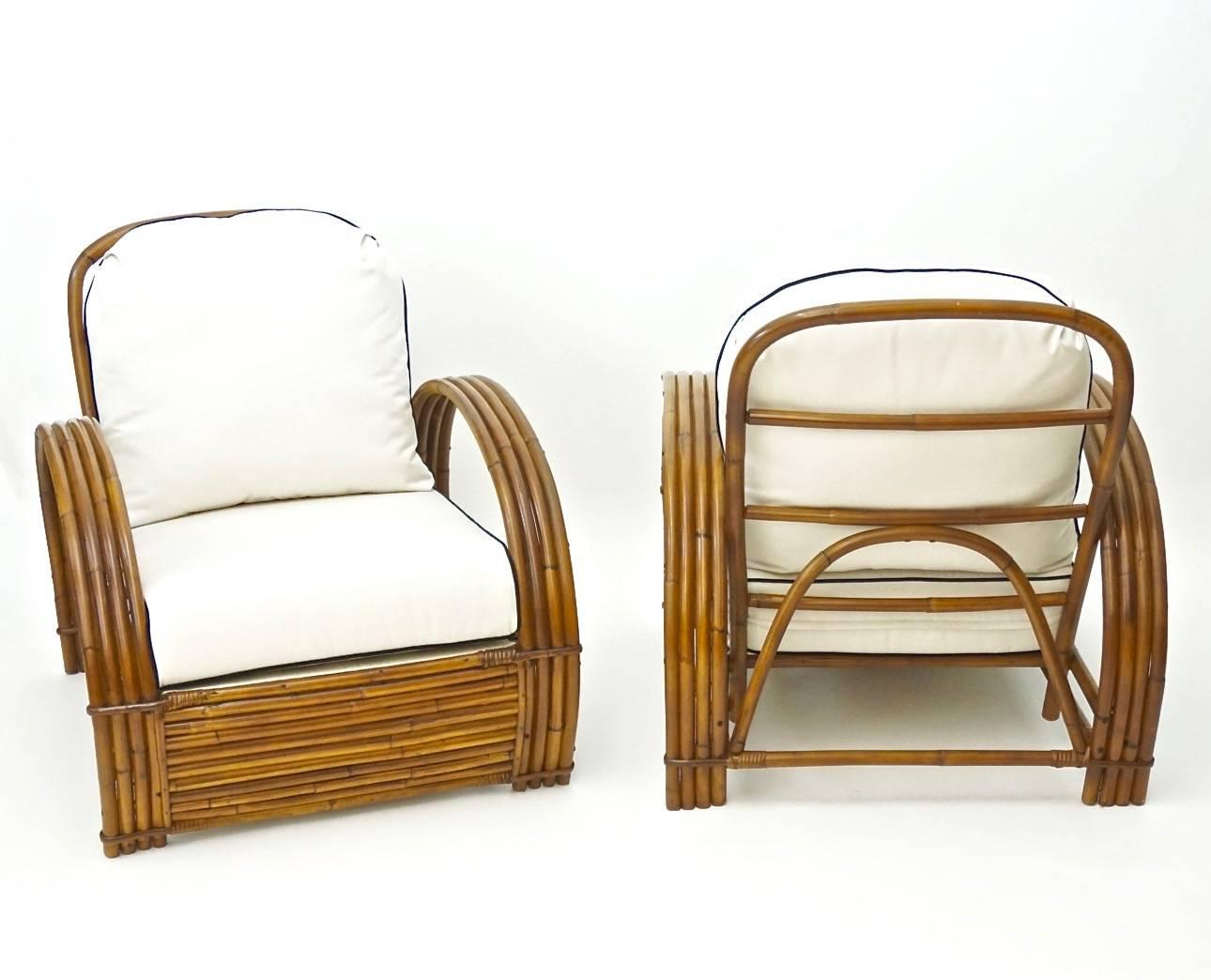 Pair of Rattan Lounge chairs and Ottoman with new-made Sunbrella Fabric cushions. Creme with black piping. Indoor/outdoor fabric.

20% OFF listed prices on all our items Nov. 1-30.