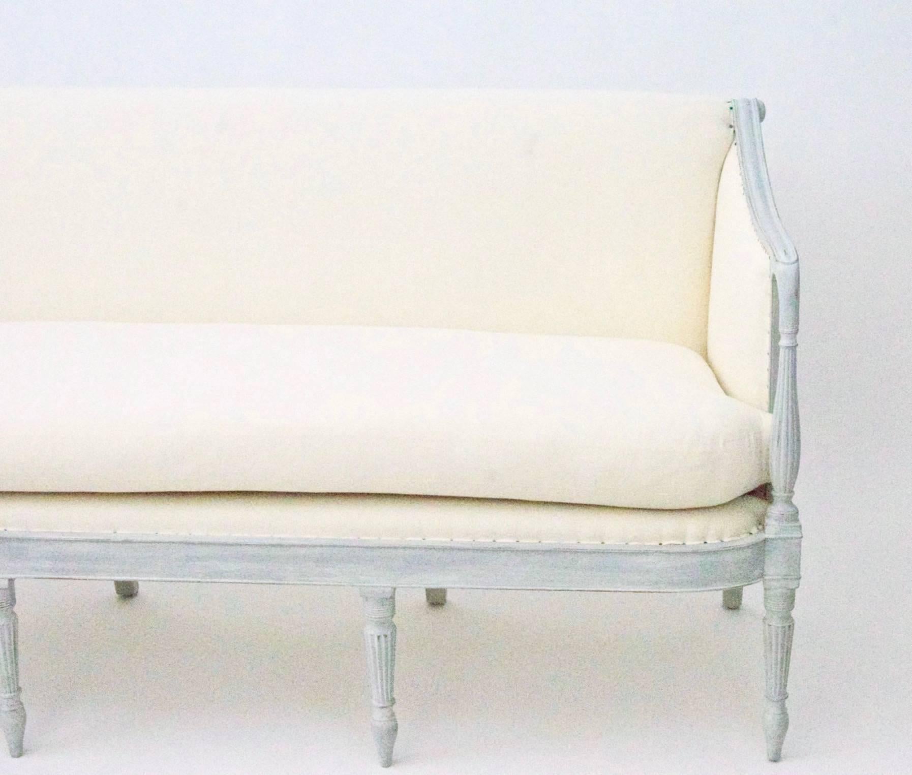 This vintage Federal Sofa is newly upholstered in muslin. Mahogany frame newly painted in a grey finish. The cushion is made up of an extremely comfortable 50-50 down and feather wrap over medium firm foam core interior. 

Inquire about