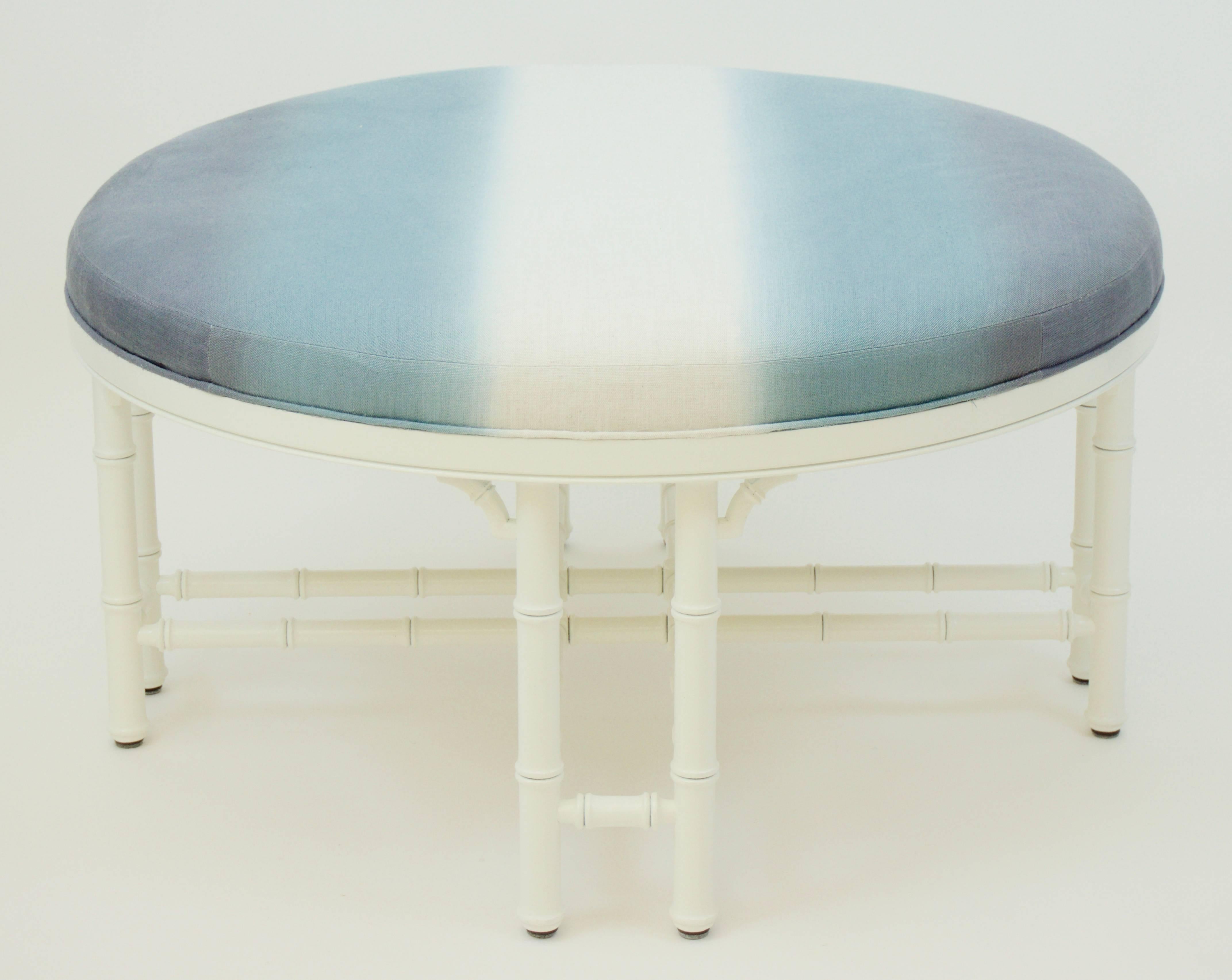 Large round vintage ottoman. The top is newly upholstered in Stroeheim Vacheron in Ombre Haze. The base and legs are lacquered in white.
Measures: 40" diameter, 21" high.
