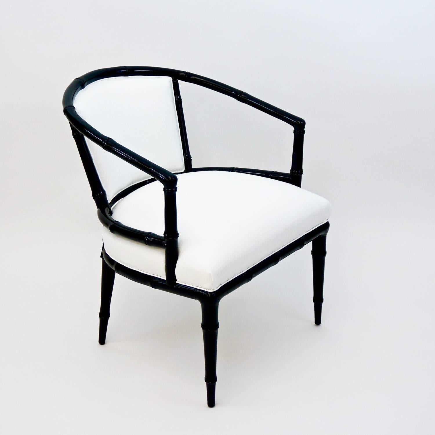 Vintage Hollywood Regency chair with jet black newly-lacquered arms and legs. Seat and back are newly upholstered in soft white linen fabric.

