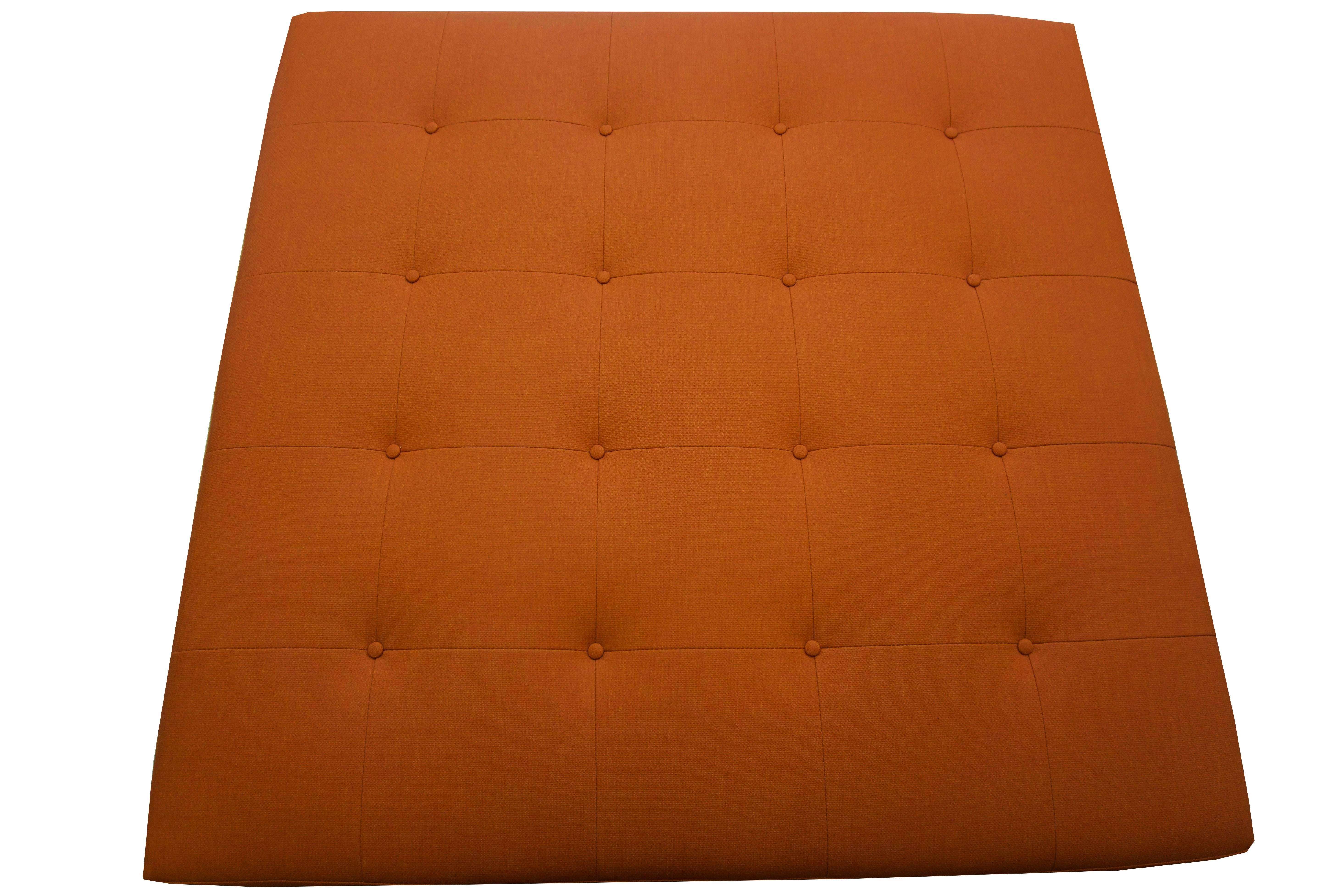 Orange vinyl ottoman made by us in Norwalk, Connecticut.
A comfy add to your room, this ottoman is big enough for you and your friends to lounge and rest upon.