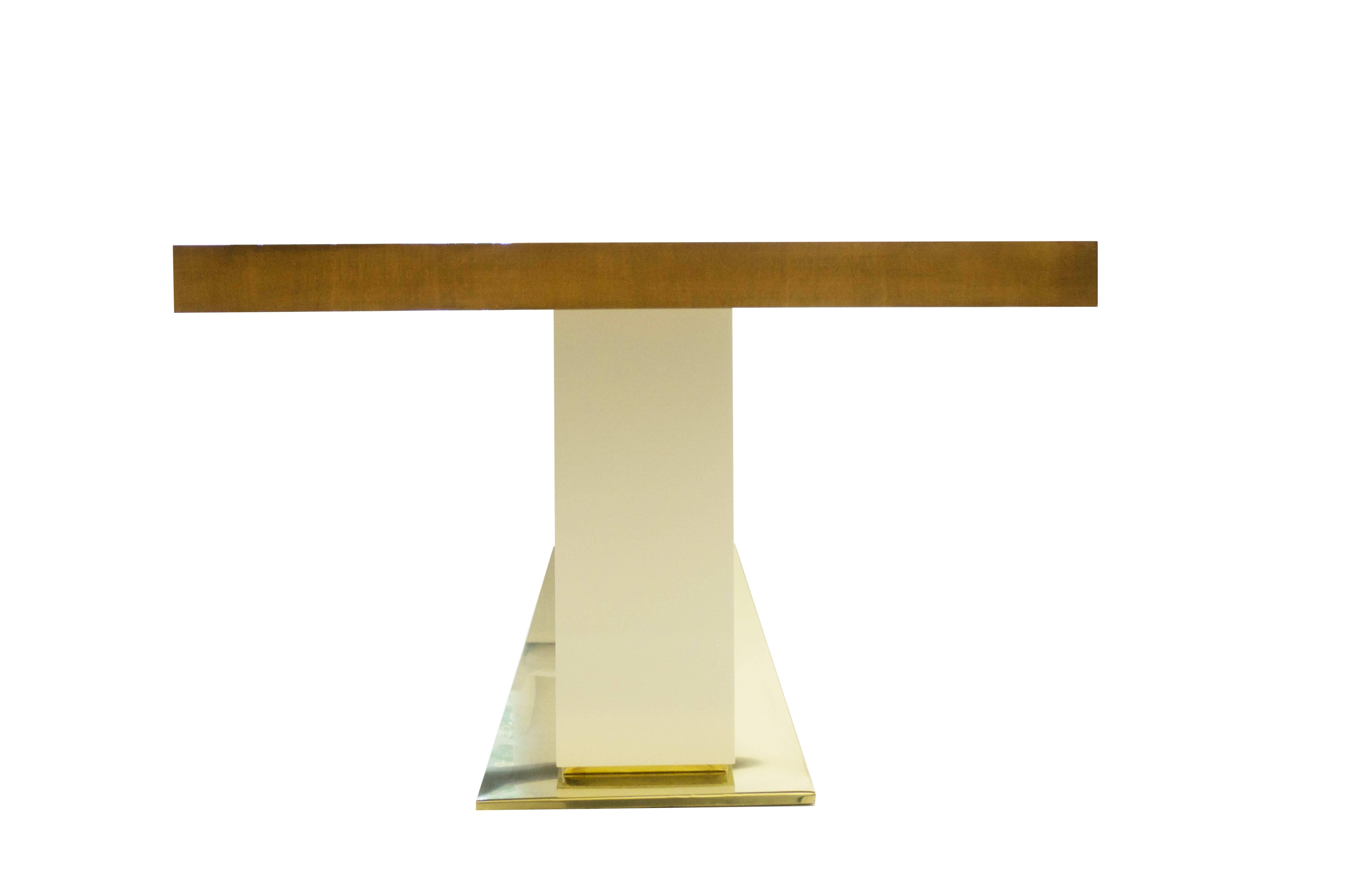 Polished brass based, white lacquered wood pedestal with three-ring design, and wood top with honey-walnut finish. Original design by Jhon Ortiz. The table has a grandiose presence and seats 8 comfortably, 10 snugly. Pairs well with our Scandinavian