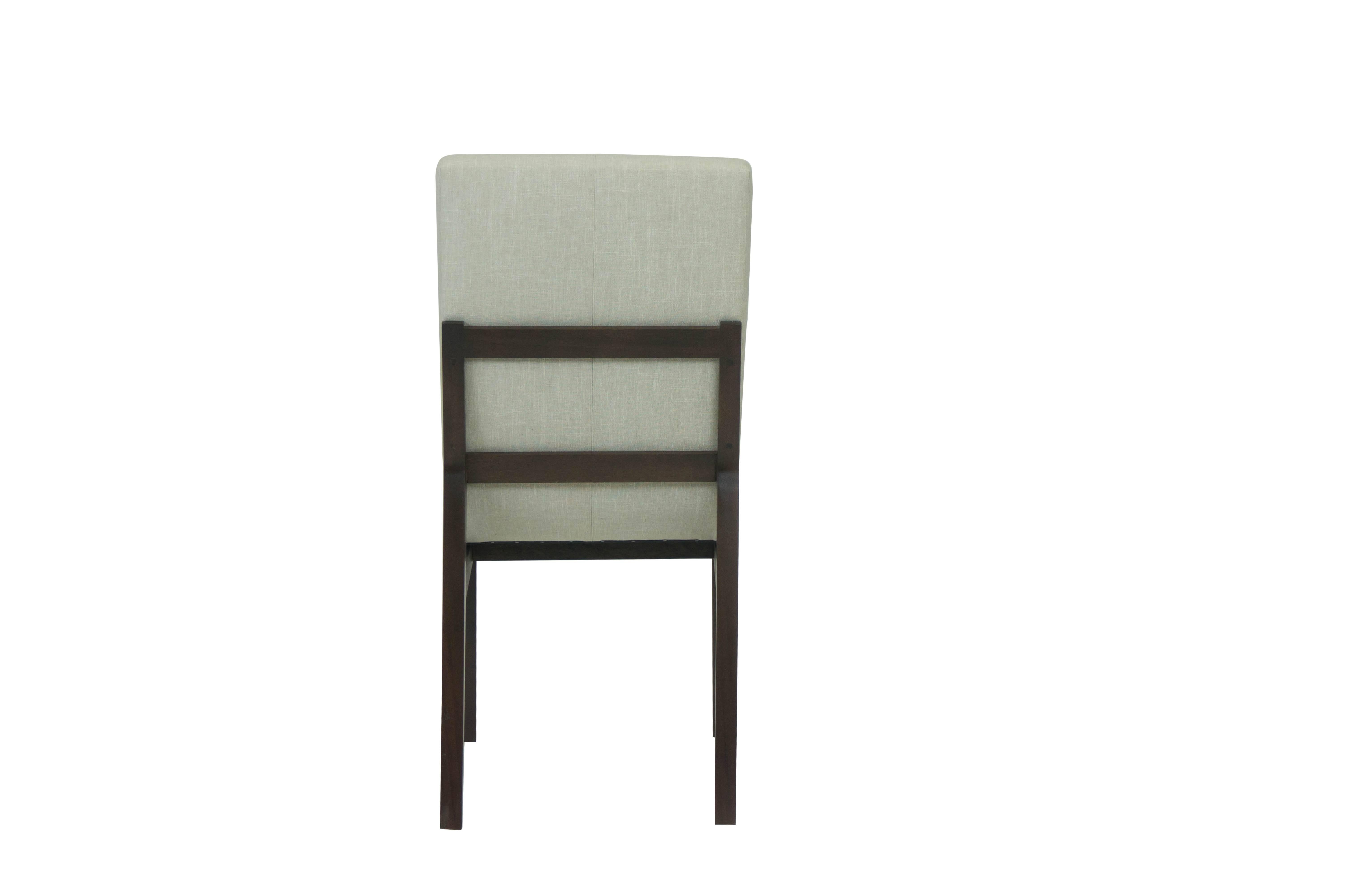 The principal feature of this dining chair is its reclined shape. Typically, dining chairs are meant to keep us upright and in 
