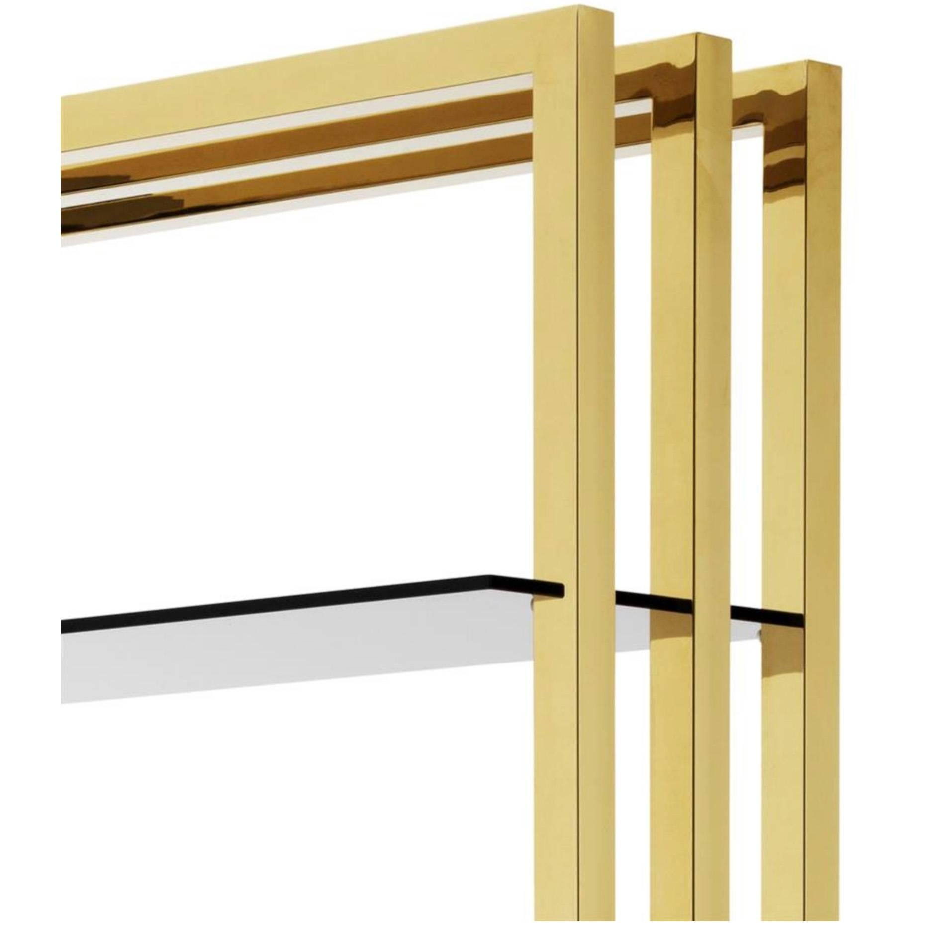 La vetrina a torre Cipriani è una moderna scaffalatura in metallo da utilizzare come libreria o come credenza aperta. Presenta un'armoniosa combinazione di ottone, cromo e vetro fumé. Lussuoso ed elegante. Vetrina a torre Cipriani

Due disponibili