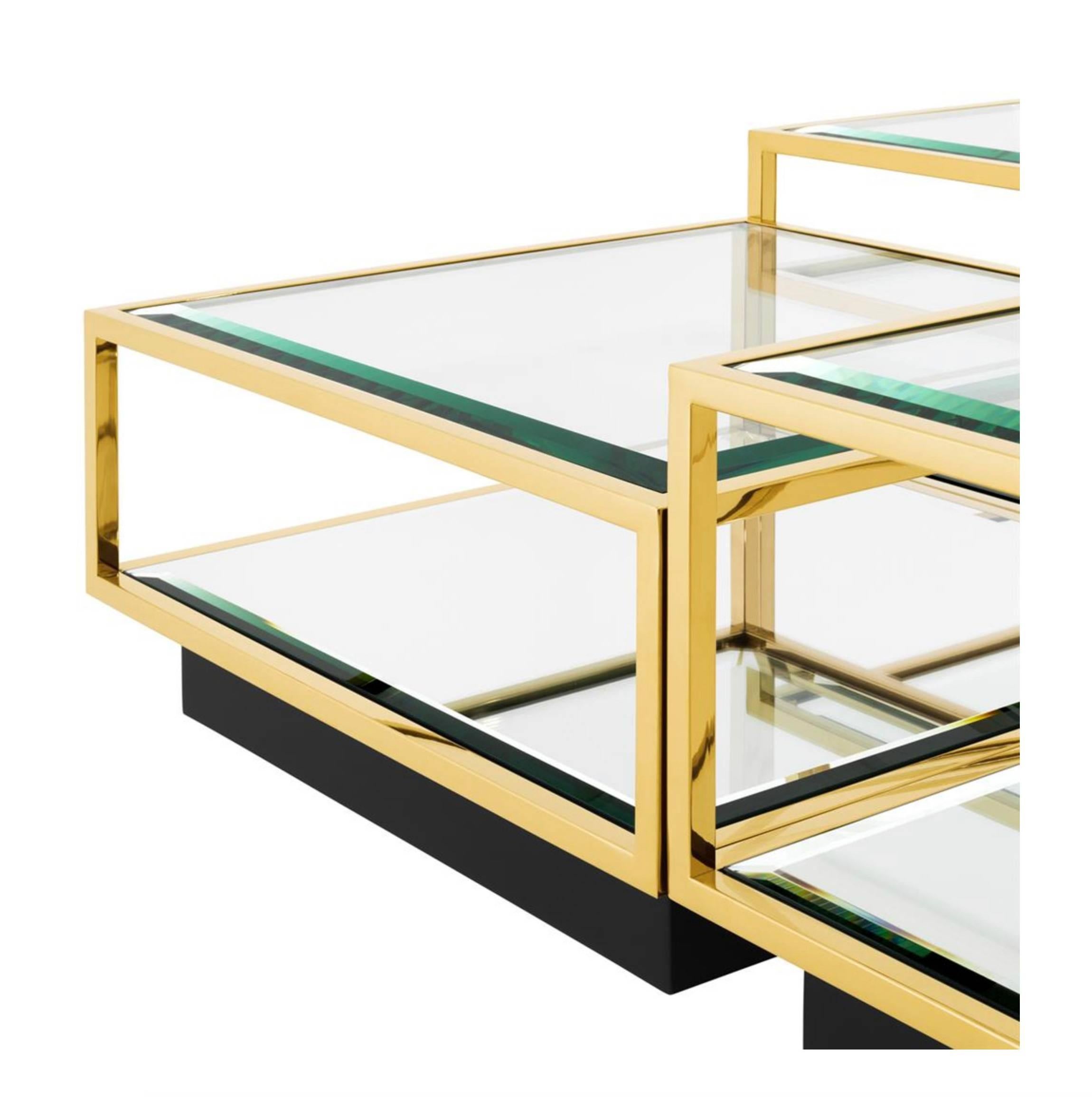 Set of four metal tables with beveled glass tops and beveled mirrored glass on base. Gold finish on metal. Clean and elegant coffee table option for large room.

Measurements: 13" H x 26" W x 26" D
 15.5" H x 26" W x
