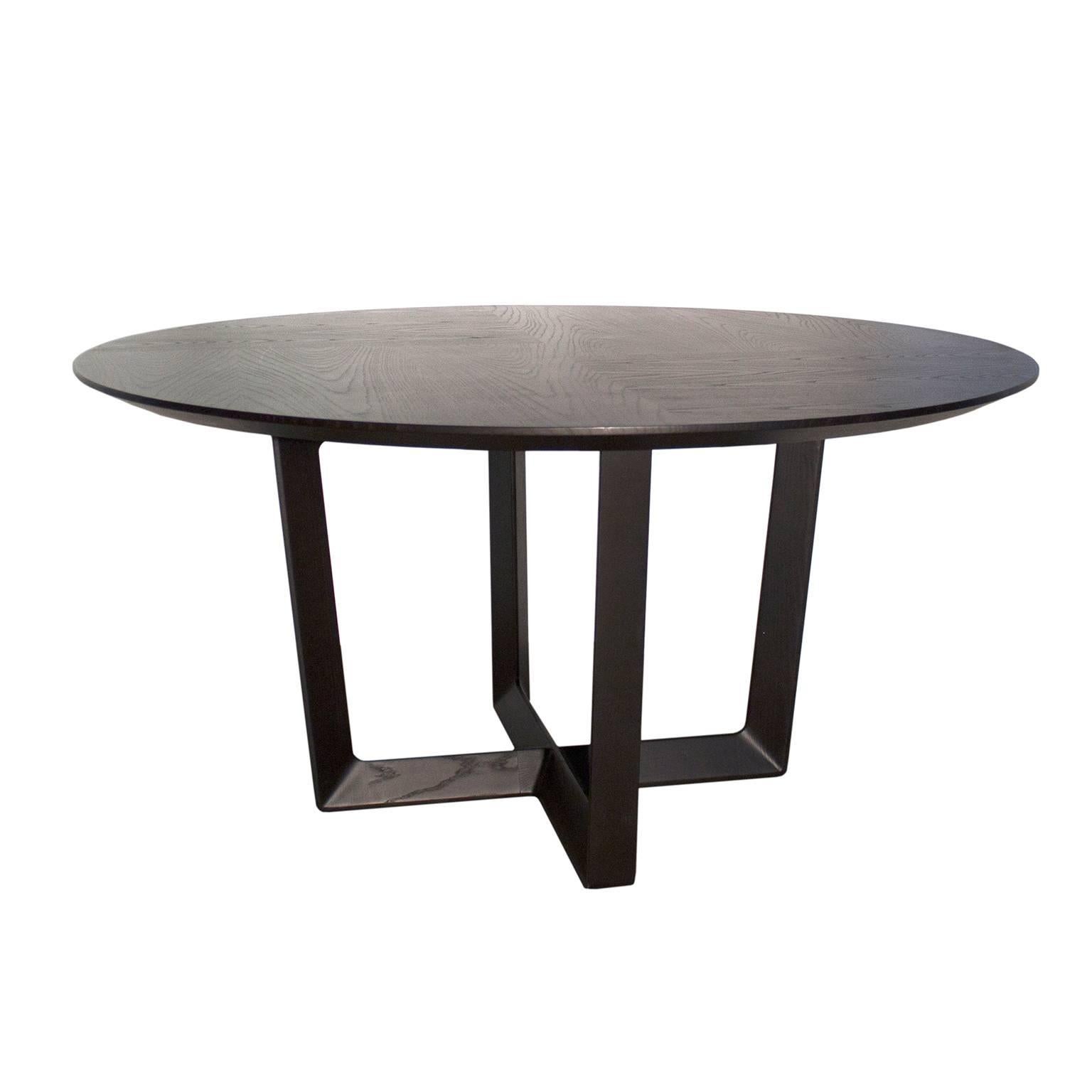 Roberto Lazzeroni has designed the “Bolero” table, a Minimalist and sleek addition to the living room. The frame supporting the table is in wengé-stained solid ash with a triangular section profile. 5566633.
