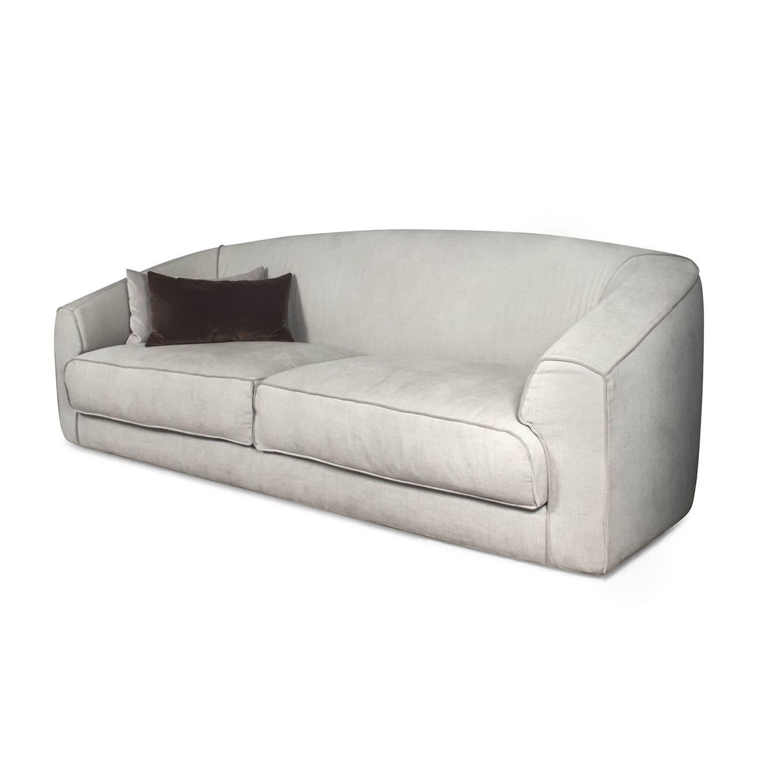 Sofa with solid wood frame designed by Massimiliano Raggi. Comes with two cushions.