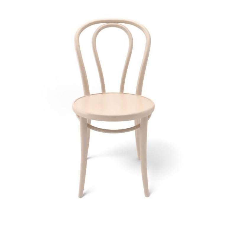This chair was introduced in 1876. A backrest is filled with manually bent rod that copies the outlines of the backrest.