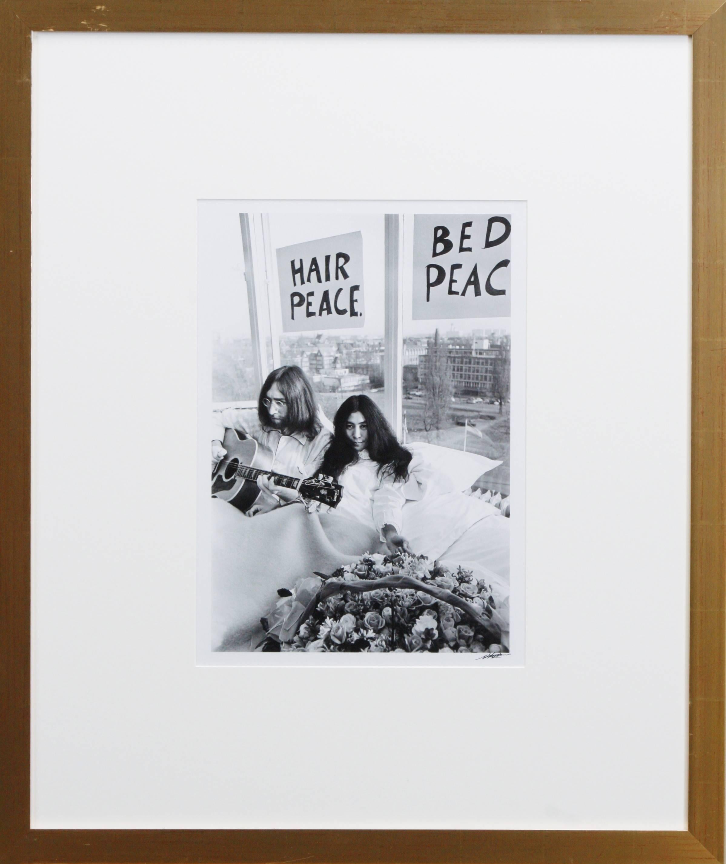 
Signed by Nico Koster. Dutch photographer (Amsterdam 1940) who made the pictures of John Lennon and Yoko Ono during their Bed-in. 
This picture is from the Amsterdam Bed-in (25 march until 31 march 1969) after there honeymoon and are signed and