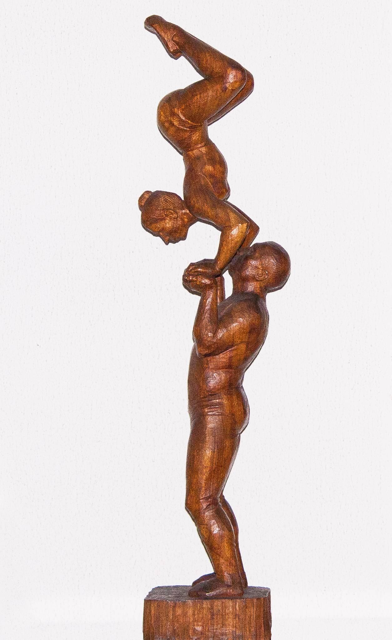 Beautiful wooden sculpture of Cornelis Jan (Cor) van Kralingen (1908-1977).
The title of this sculpture is 'the acrobats.'
Other famous sculptures by his hand are: ‘the falling man,' ‘Kneeling woman with Pigeon,' 'The Twentse ros,' 'aquatic