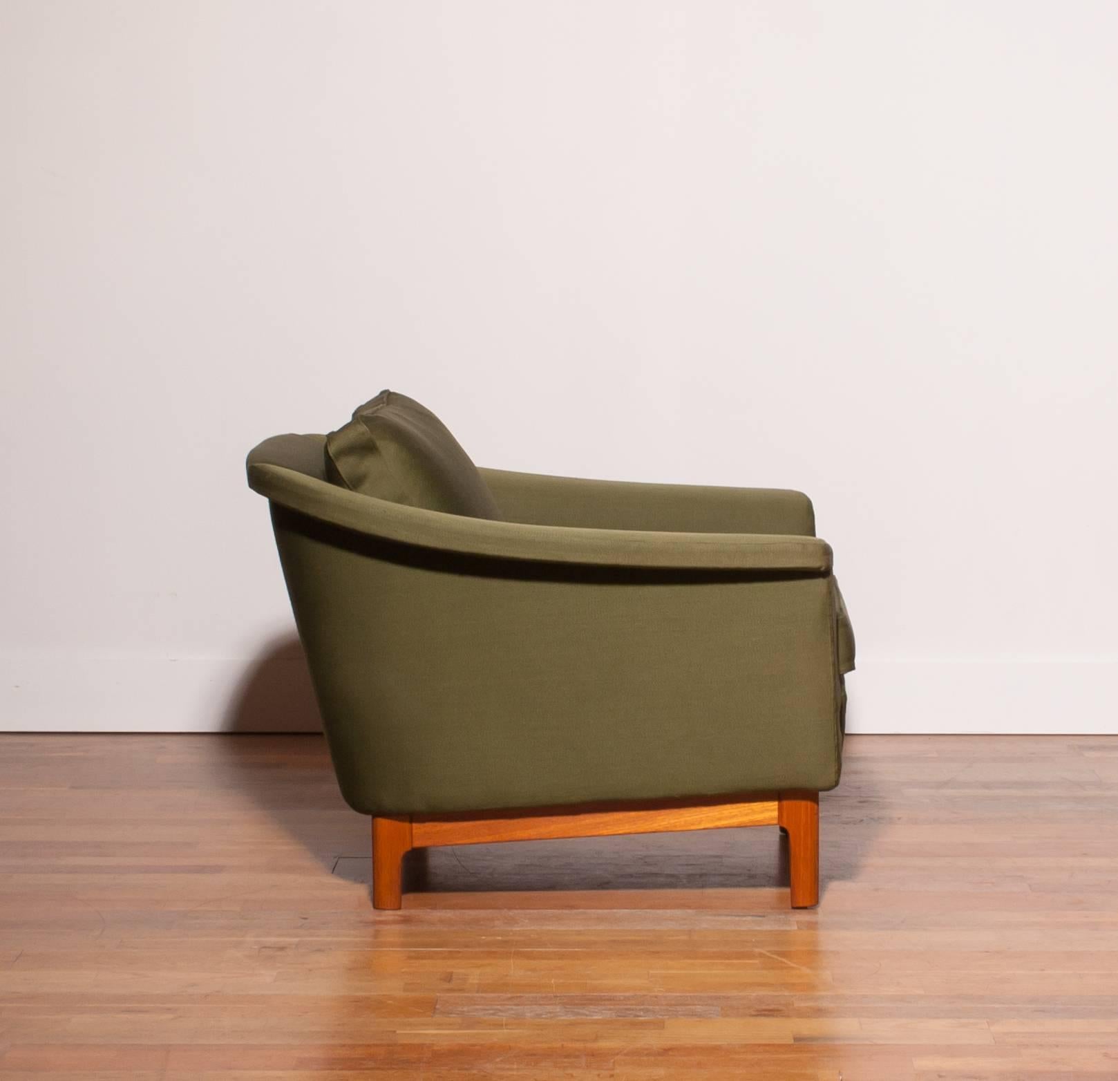 Swedish 1960s, Green Lounge Chair by Folke Ohlsson for DUX.