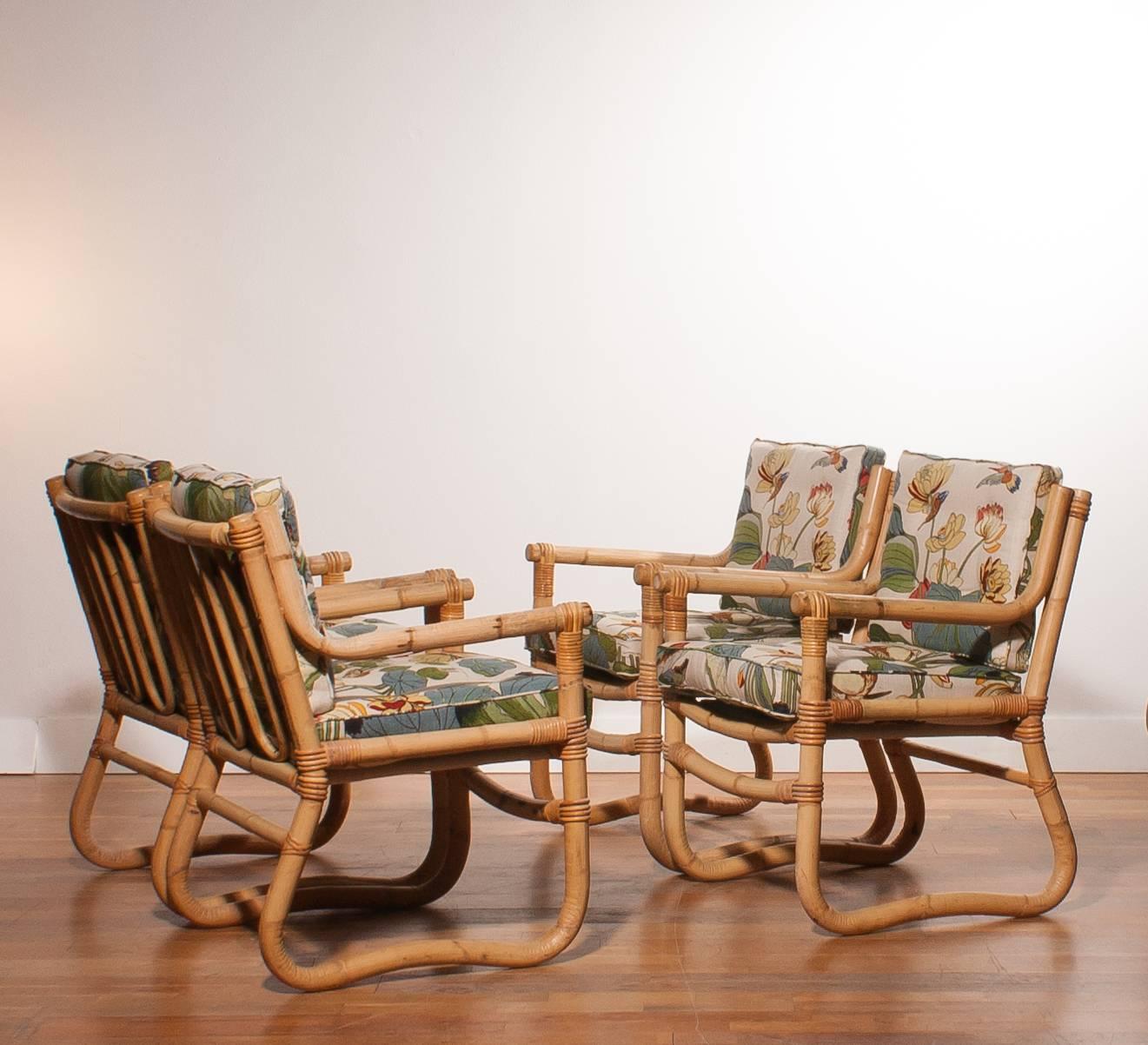 Beautiful bamboo garden set consist of four chairs and a square table.
The chairs are in a excellent condition.
The reversible cushions are designed by Josef Frank and in a very good condition.
Period 1960s
Dimensions: Chair H. 80 cm, W. 60 cm,