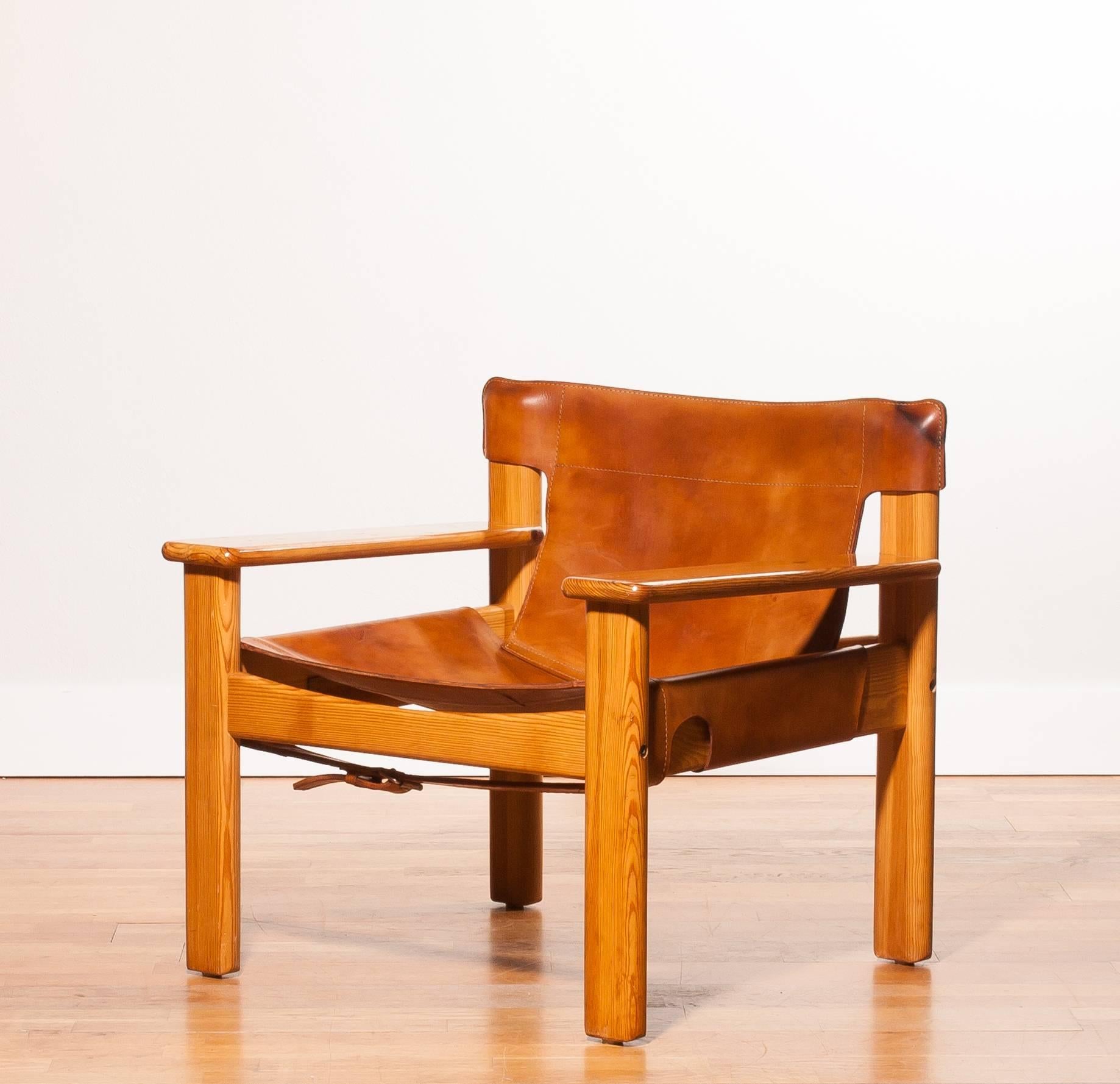 This beautiful chair is designed by Karin Mobring  Sweden.
The chair has a frame made of pine and the seating is made of very thick and sturdy cognac leather.
It is in a very beautiful condition.
Period 1970s
Dimensions: H 69 cm, W 73 cm, D 65 cm,