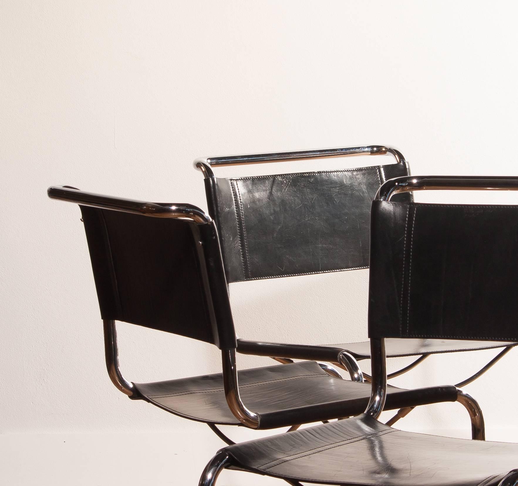 A beautiful set of six dining chairs designed by Mart Stam for Fasem.
These chairs have a cantilevered tubular metal frame with black saddle leather seating and backrest.
They are in a wonderful condition.
Period 1970s
Dimensions : H 84 cm , W