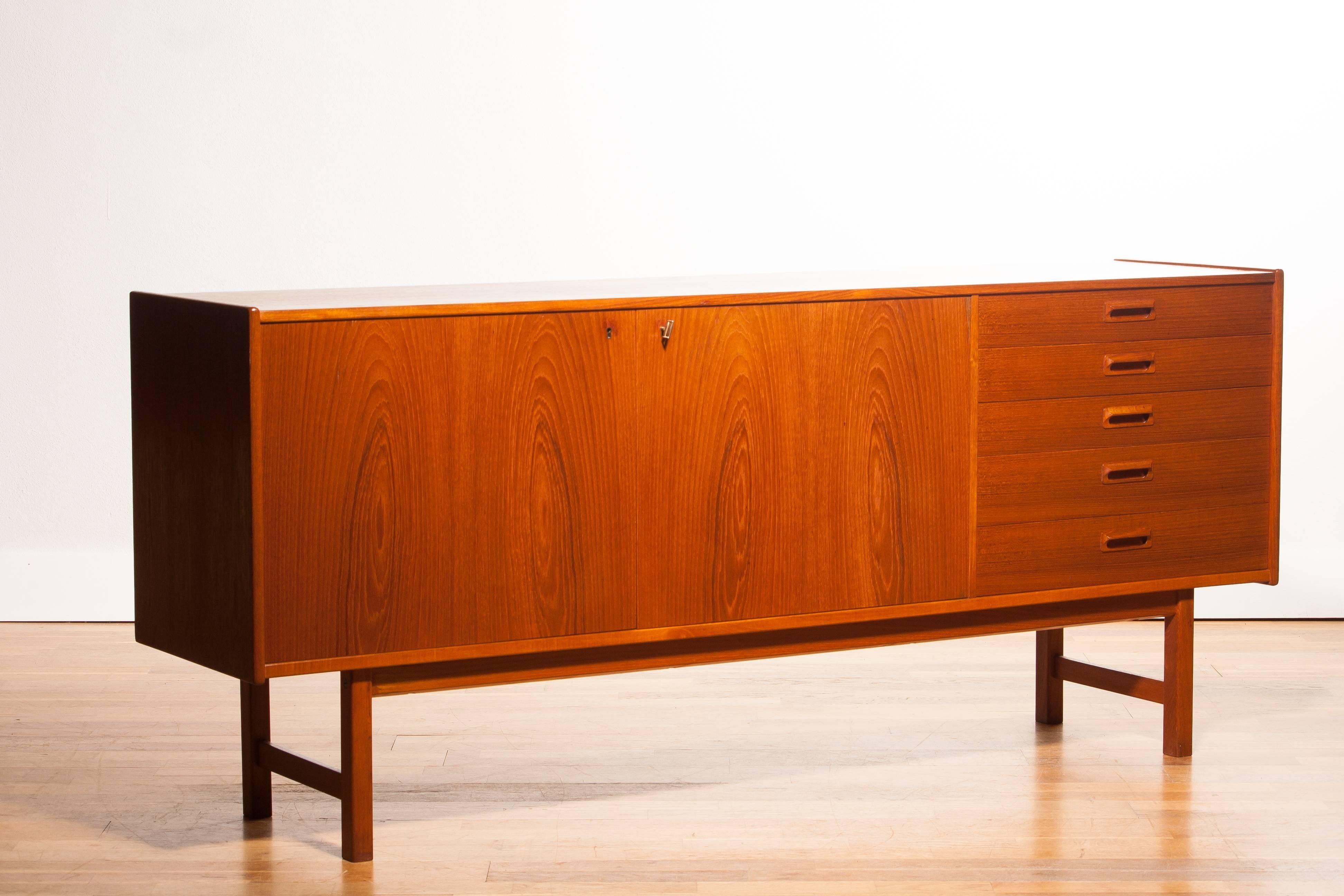 Very beautiful sideboard made by Ulferts, Sweden.
This cabinet is made of teak and has five drawers and two doors.
It is in a wonderful condition.
Period 1960s
Dimensions: H.79 cm , W.183 cm , D.43 cm.