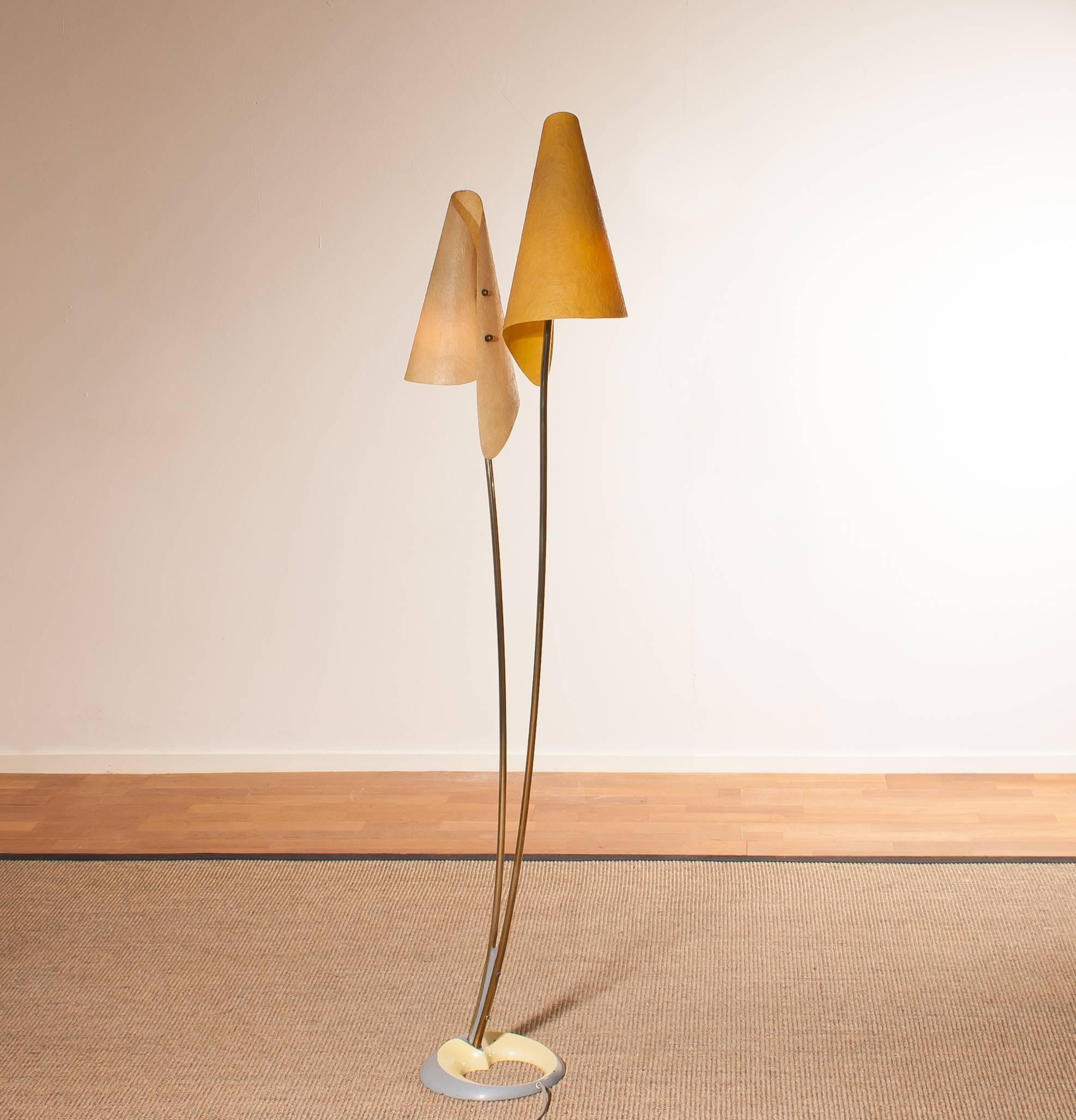 Very rare and beautiful floor lamp with two fiberglass shades and a wonderful design stand.
This very nice design is made in Germany.
It is in a very good and working condition.
Period 1960s
Dimensions: H 164 cm, W 46 cm, D 25 cm.