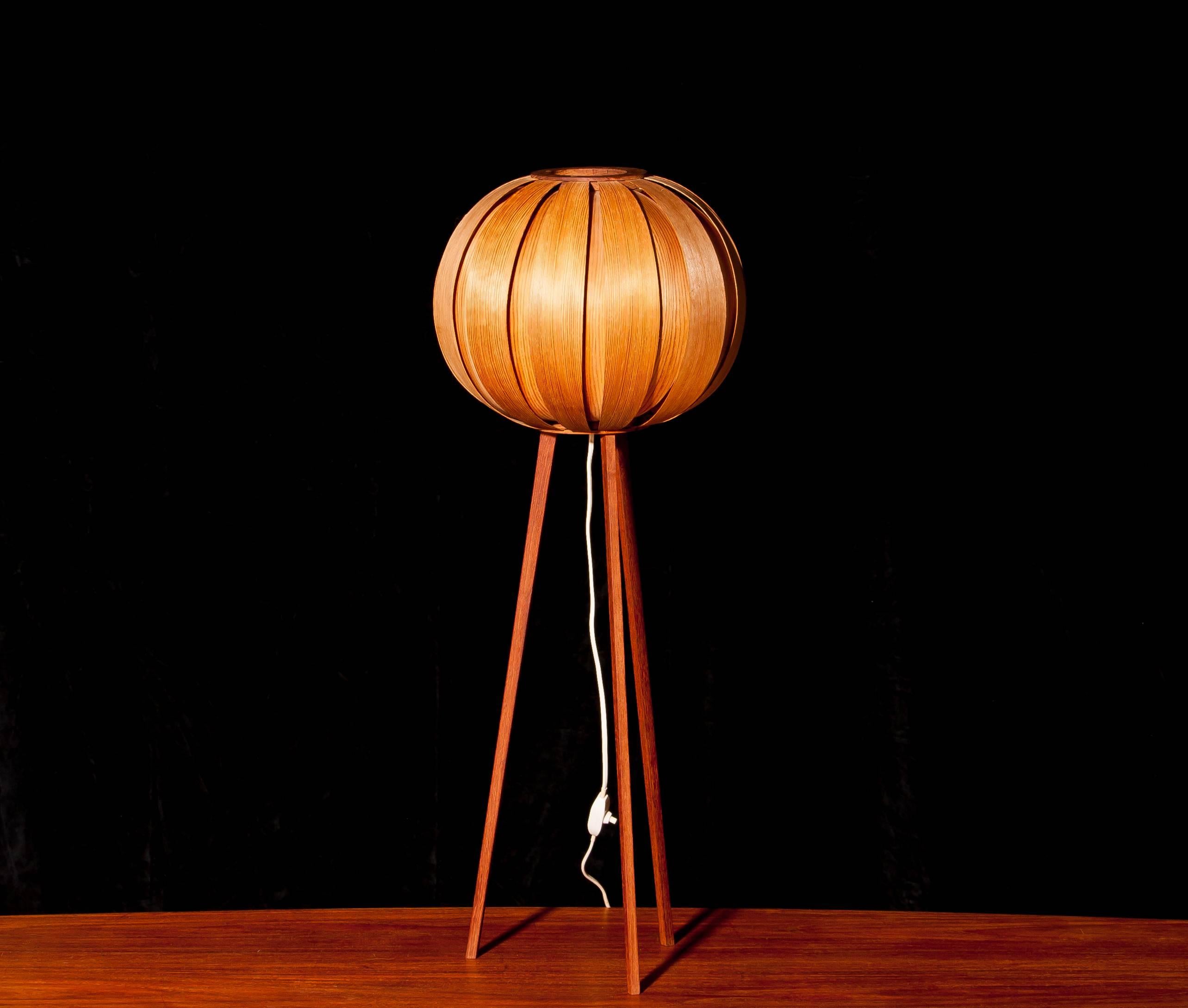Wonderful floor lamp by Hans Agne Jakobsson .
The lamp consists of extremely thin teak wood lamellas, which allows the light to go through wich gives a amazing shining .
This beautiful piece is made of teak and in a very nice condition .
Period,