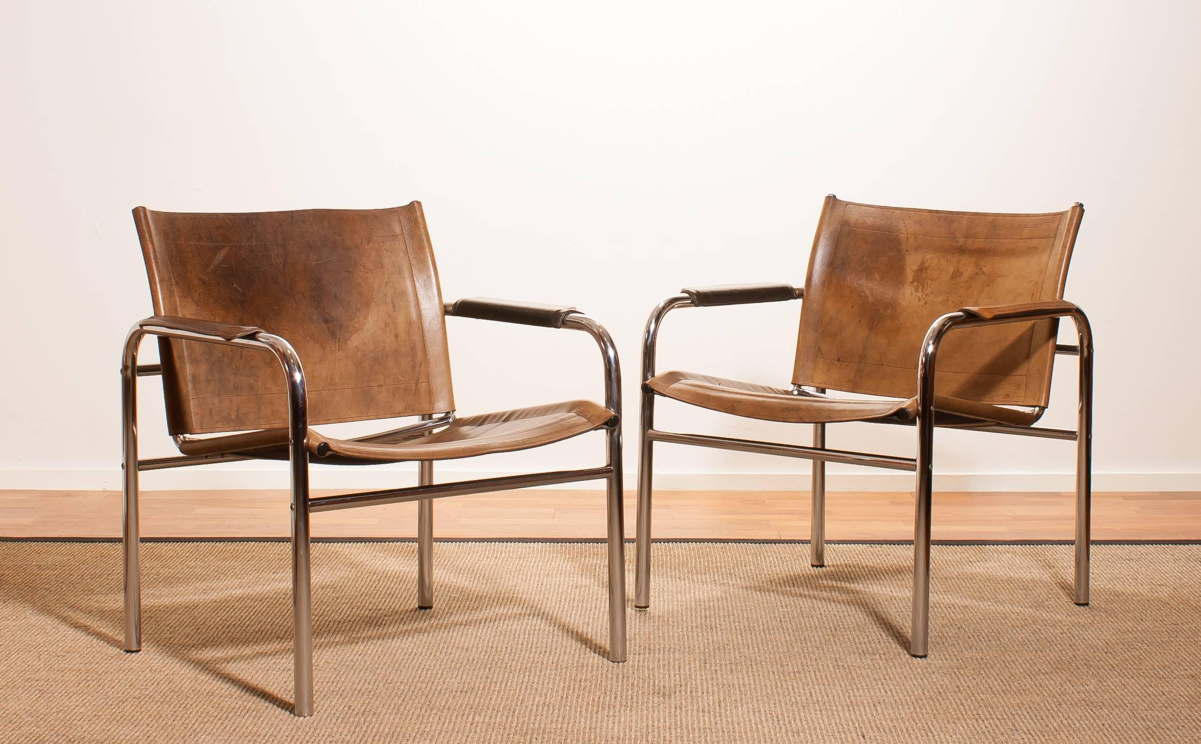 Very nice pair of armchairs, model Klinte, designed by Tord Björklund Sweden.
The chairs having a tubular chromed steel frame with light brown-taupe leather back seating and armrest with a beautiful patina.
Period 1960s
Dimensions: H.74 cm , W.68 cm