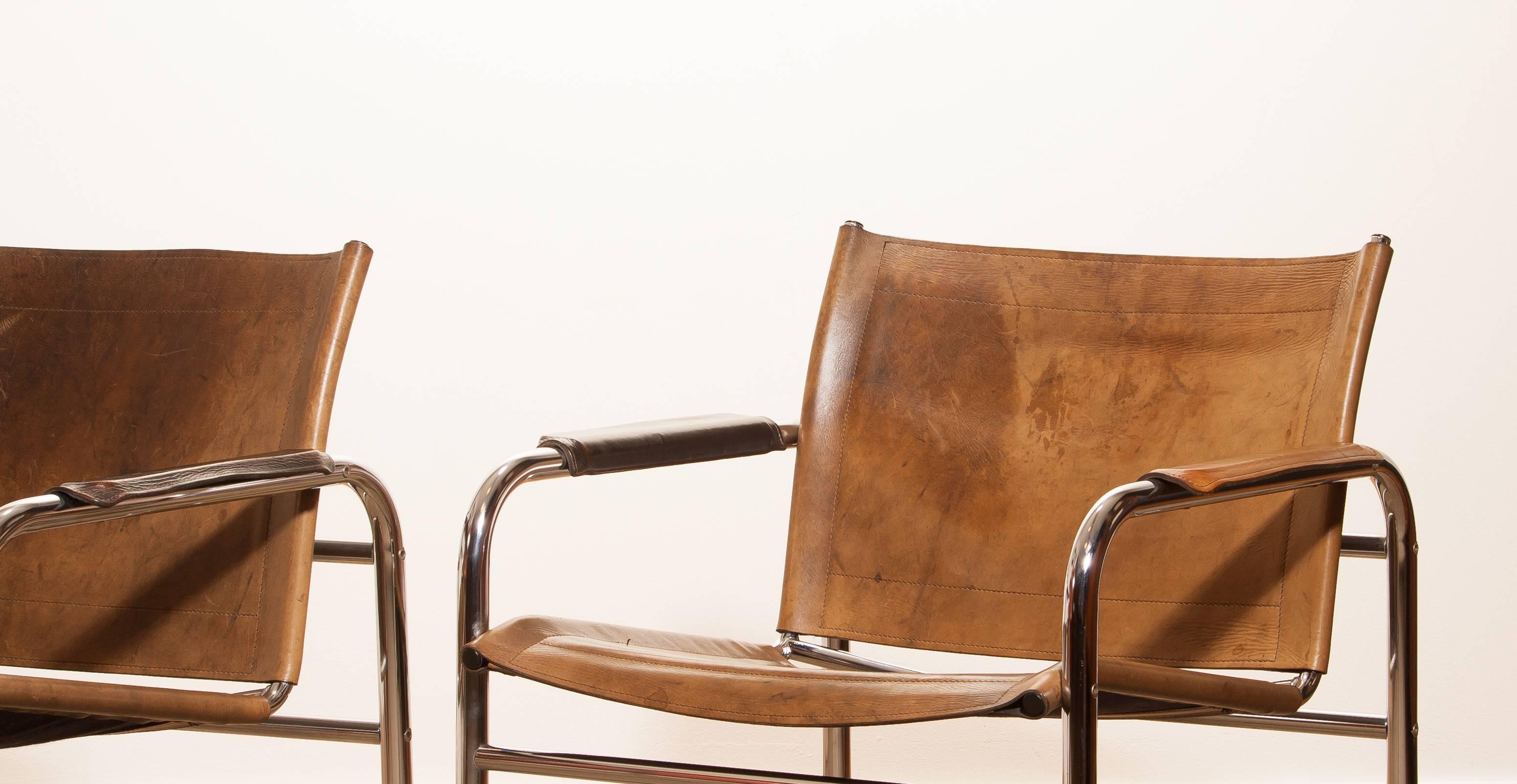 Swedish 1960s , Two Leather and Tubular Steel Arm Chairs 'Klinte' by Tord Björklund