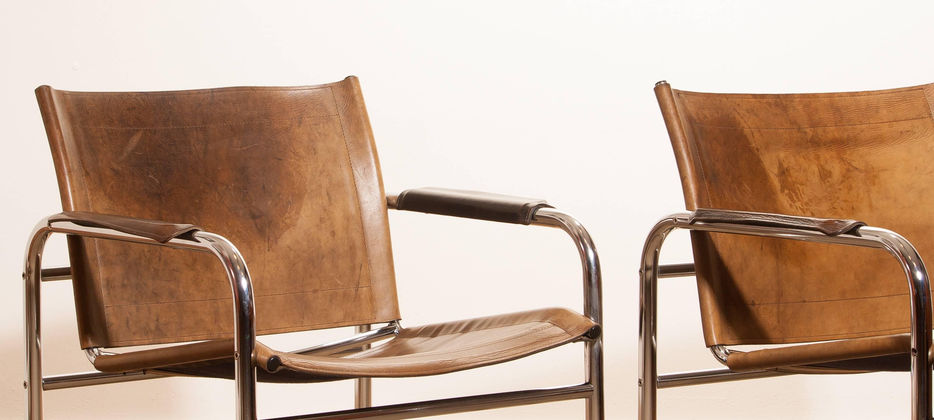 1960s , Two Leather and Tubular Steel Arm Chairs 'Klinte' by Tord Björklund 1