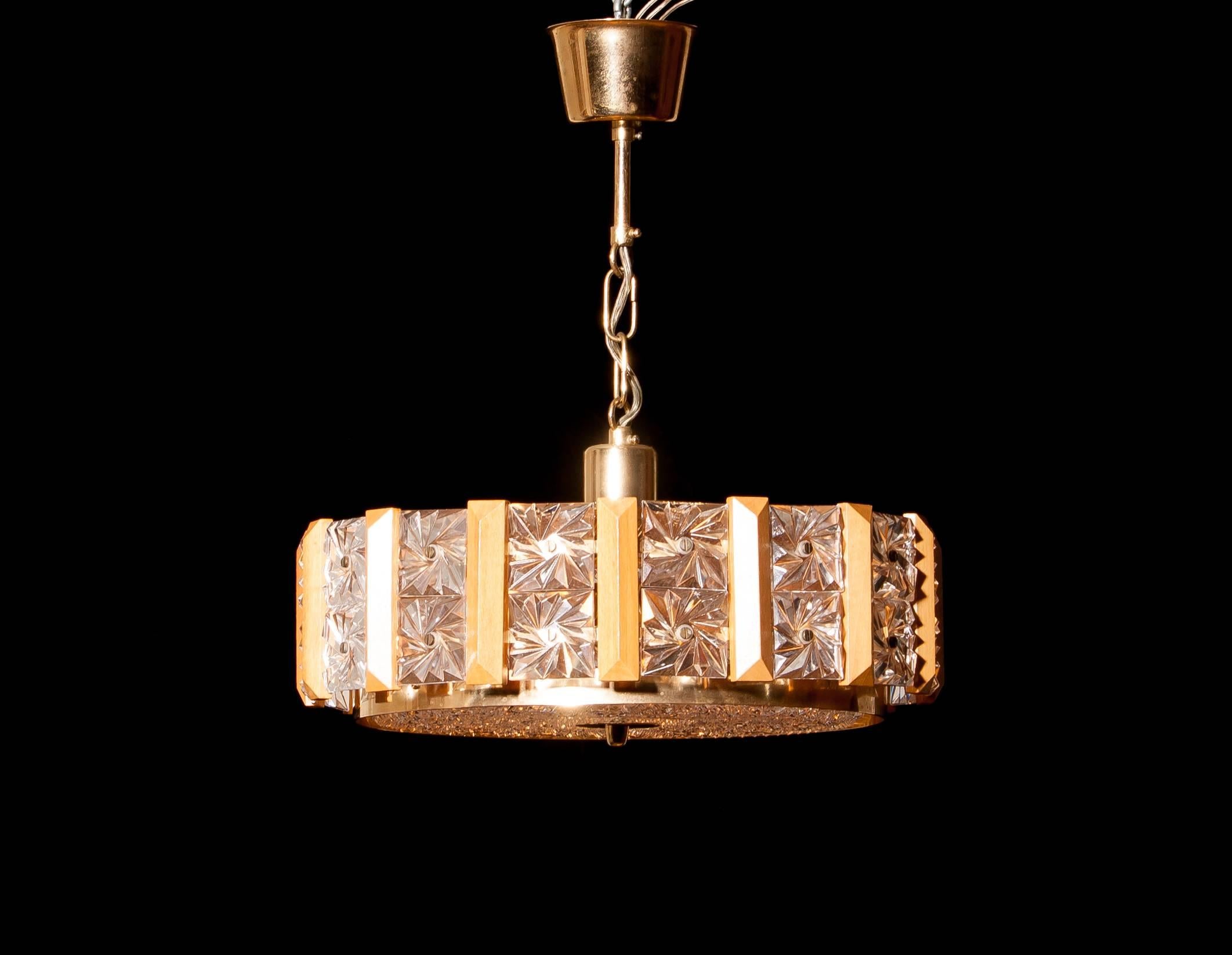Swedish 1960s, Crystal, Brass and Teak Pendant by Carl Fagerlund for Orrefors