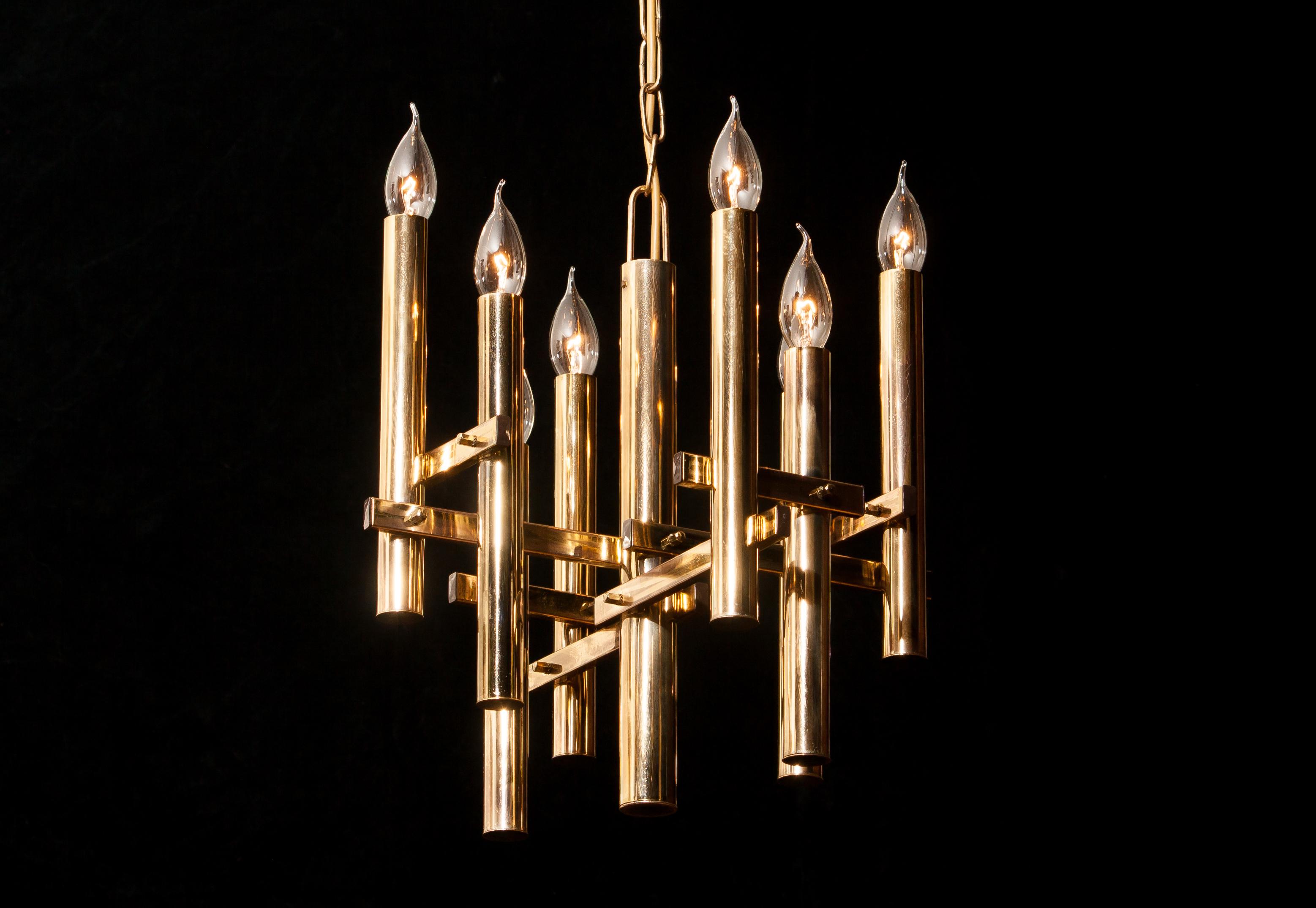 Beautiful brass pendant by Gaetano Sciolari, Italy.
This wonderful lamp has eight fittings.
The height is adjustable.
It is in excellent condition.
Period, 1960s.
Dimensions: H 93 cm, ø 40 cm.