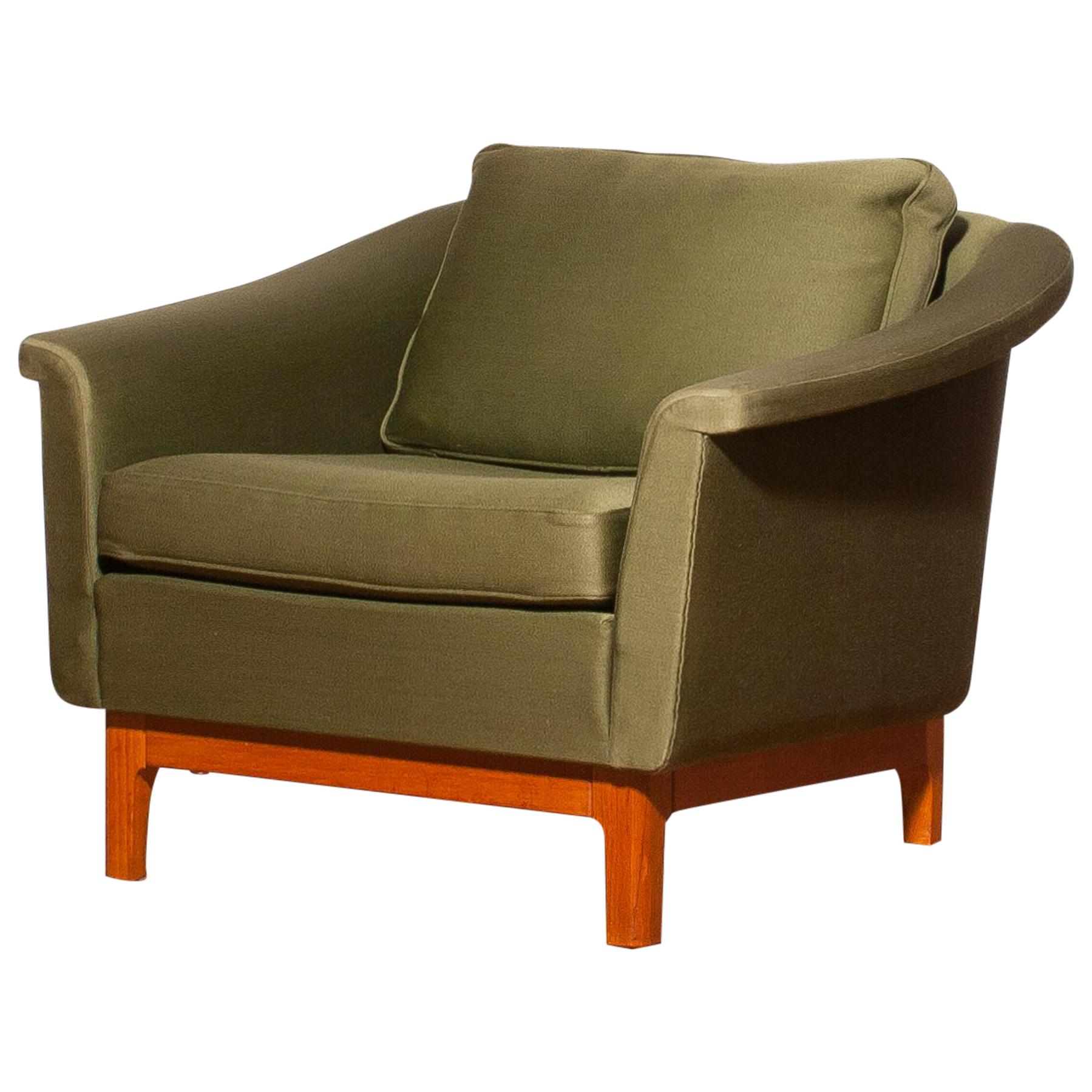 Swedish 1960s, Green Lounge Chair by Folke Ohlsson for DUX
