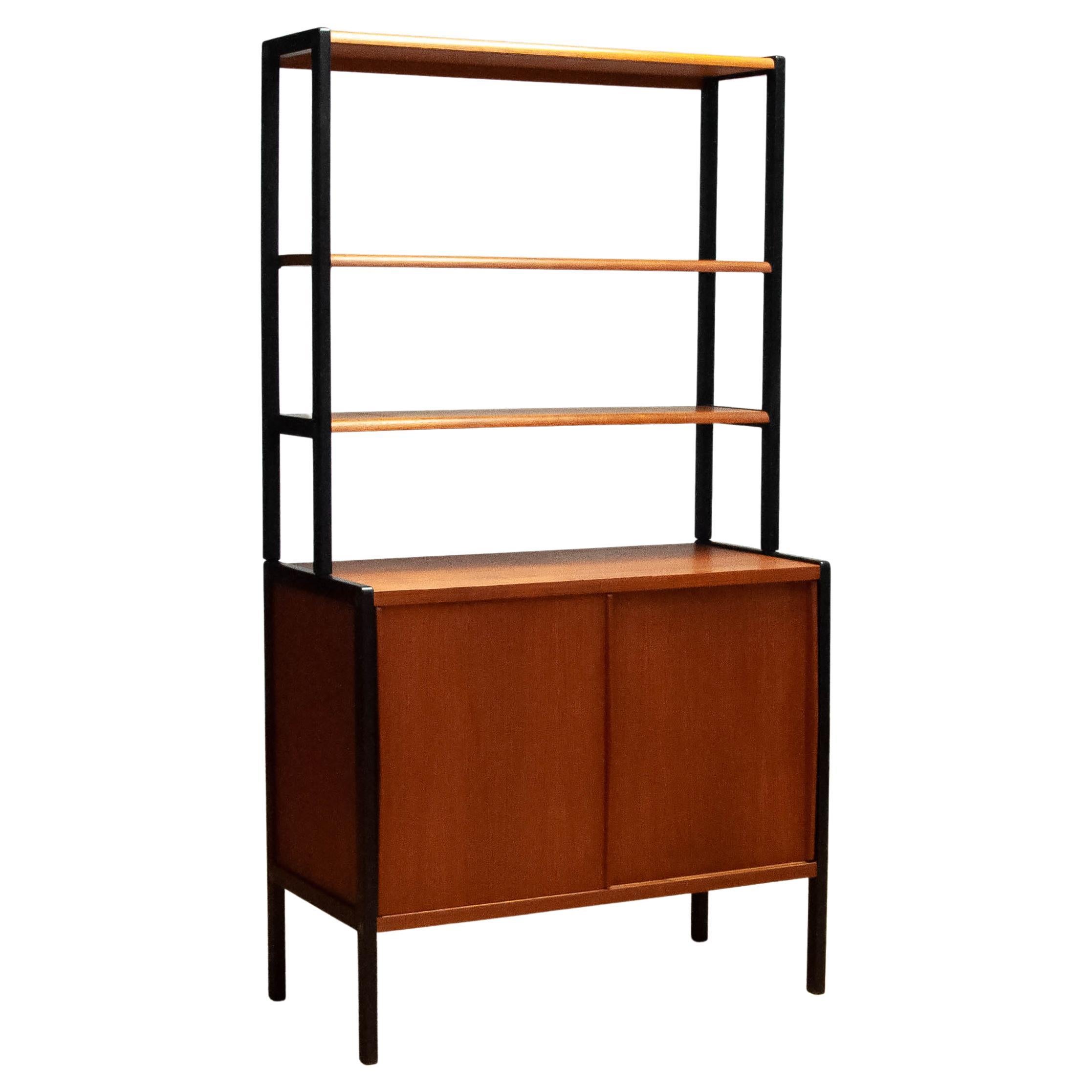 Scandinavian Bookcase In Teak With Black Lacquered Stands By Bertil scandinavian-bookcase-in-teak-with-black-lacquered-stands-by-bertil