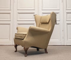 Sillón de salón con respaldo alto de los años 30, diseñado por Ernst Kühn para Lysberg Hansen & Therp. Copenhague