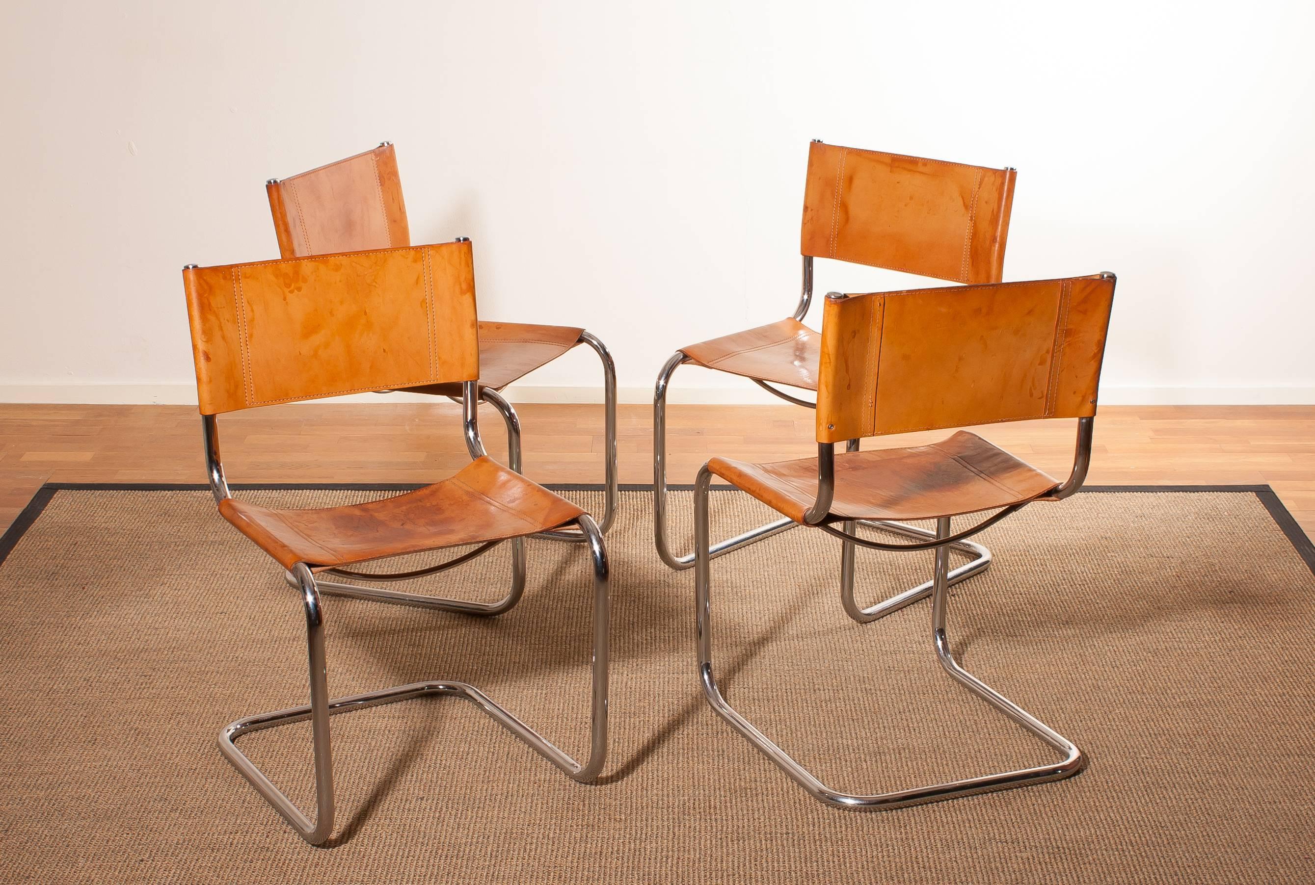 Italian 1970s, Set of Four Saddle Leather Dining Chairs by Mart Stam for Fasem