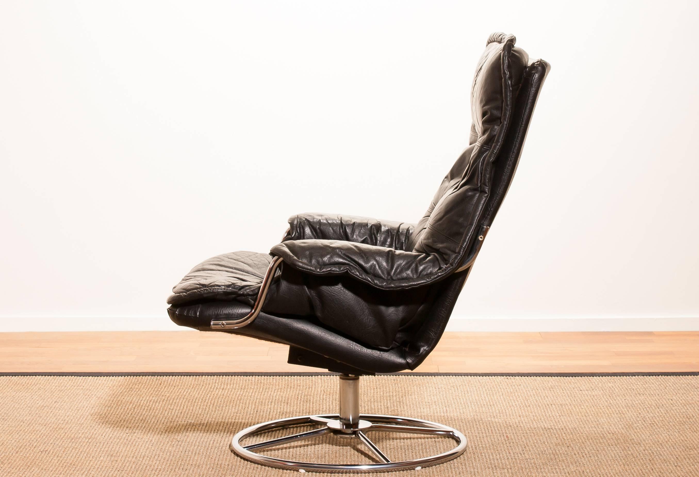 Swedish 1970s, Black Leather Swivel Chrome Steel Lounge Chair , Sweden