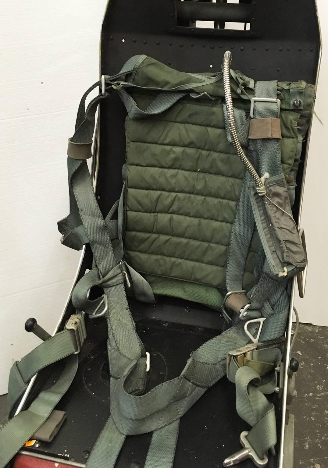 This is a pretty rare opportunity to have a polished F-16 ejection seat is an office chair. It is mounted on rolling casters and comes with everything except the parachute.
