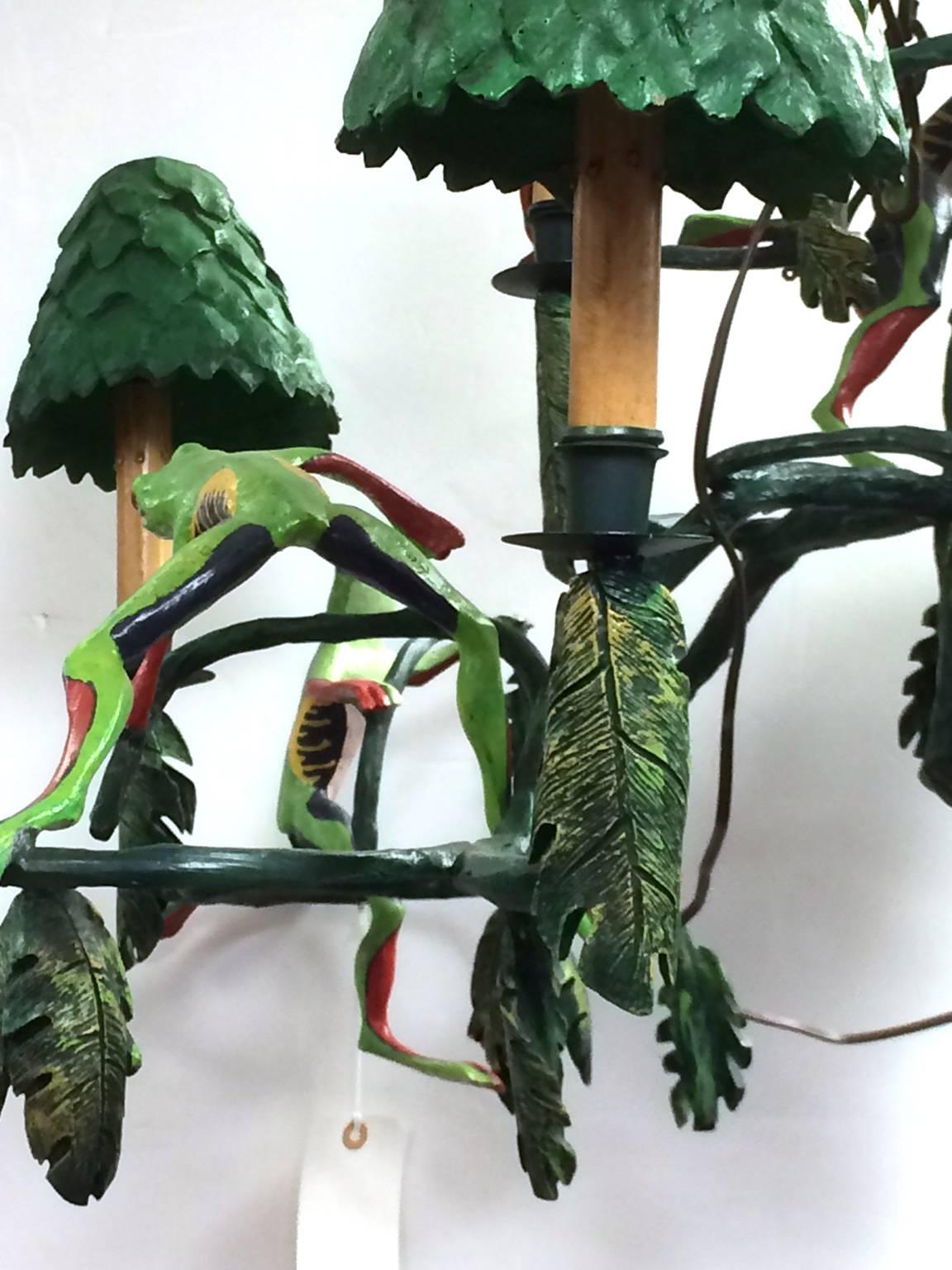 Whimsical chandelier depicting tree frogs on branches. Created in the 1980s by 