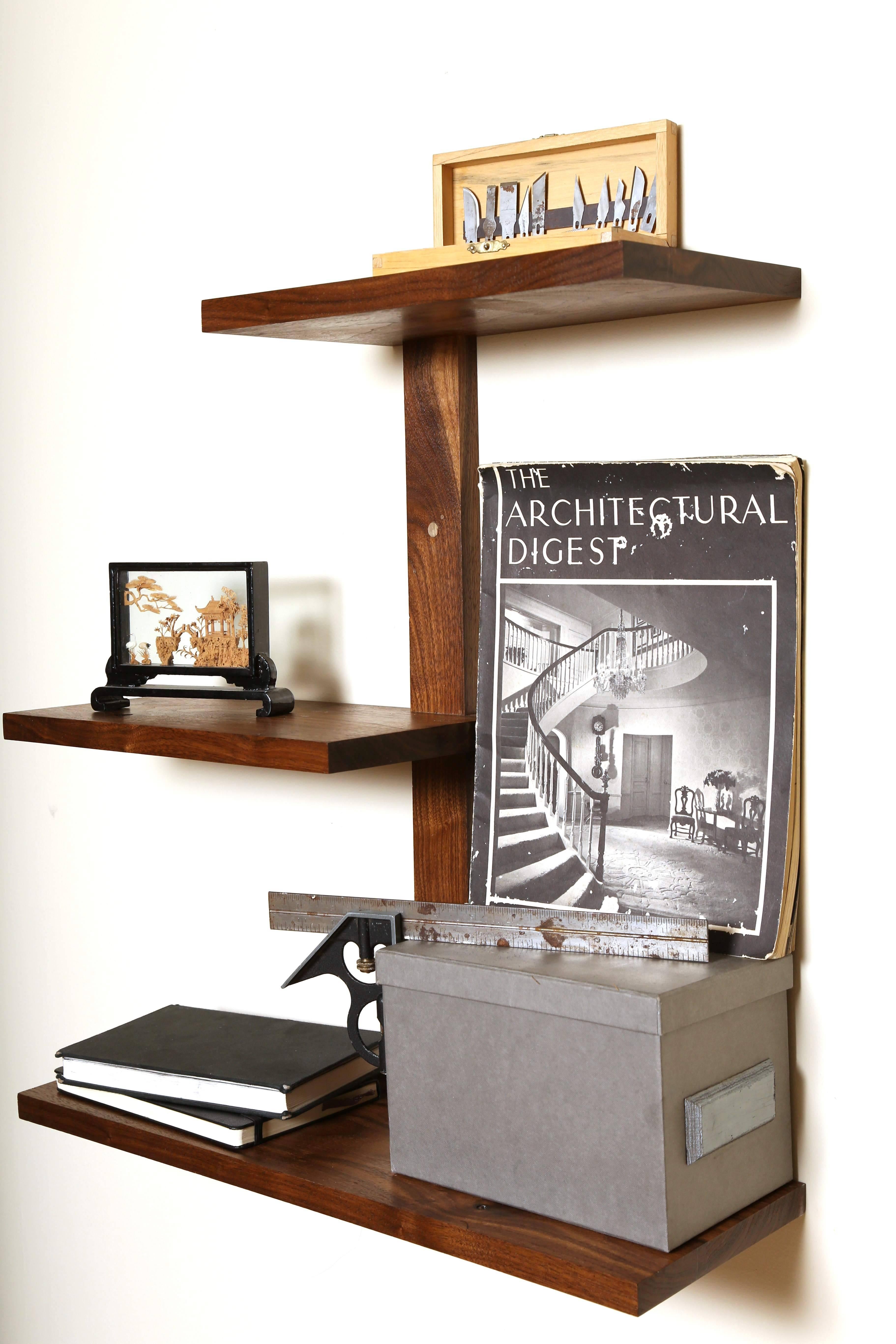Pictured dimensions: 32 x 8 x 30 inches (L x D x W).

 These Minimalist shelves are made from solid walnut with steel mounting hardware. Everything is made to order and can be customized to any size and quantity of shelves. Installation is quick