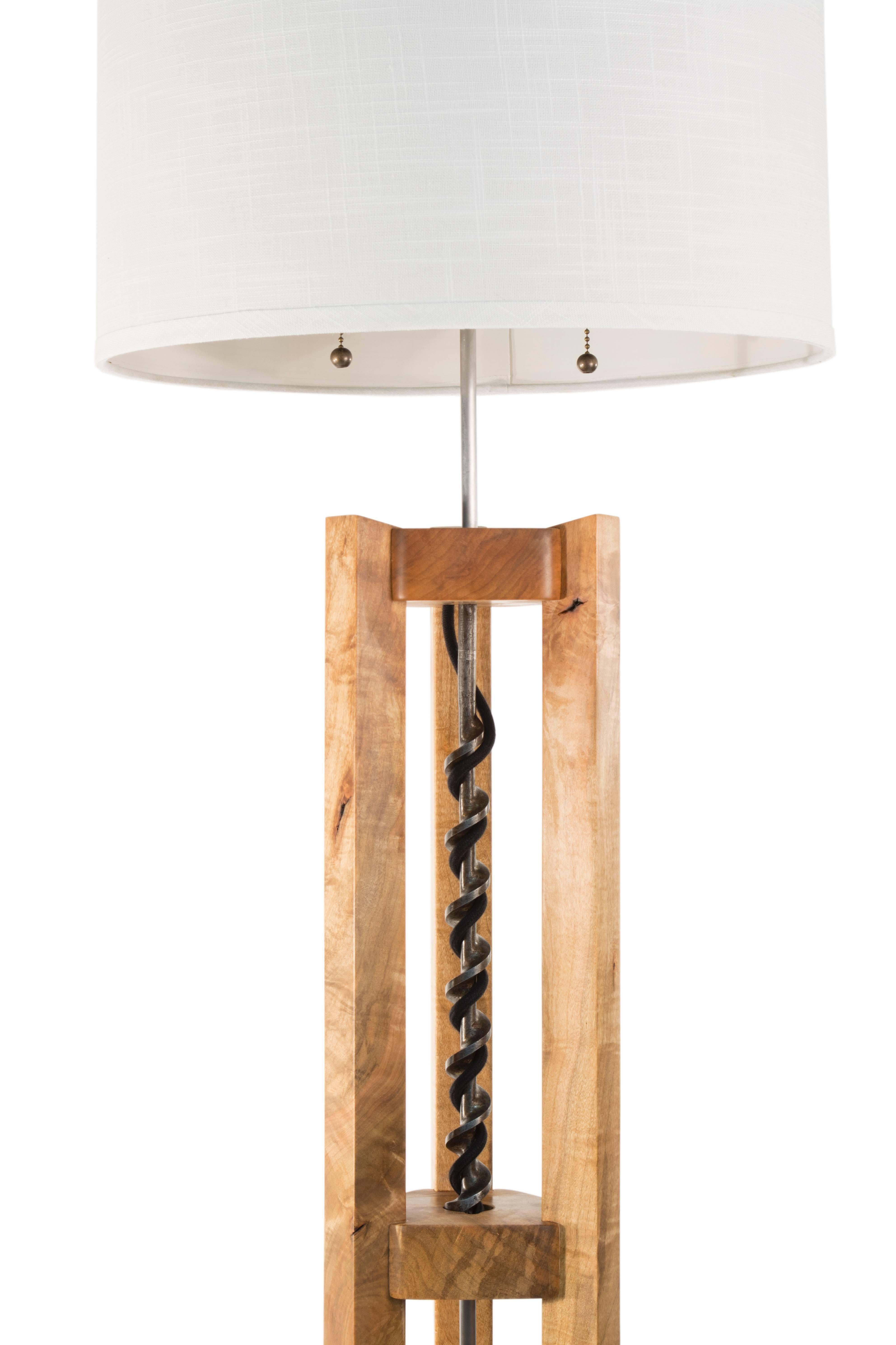 - Juniper Maple - antique drill bit - custom steel hardware 
- two socket pull cord fixture - linen drum shade - cloth wrapped cord.

Measures: 19 x 19 x 70 inches (I x W x H).

Wired for 120 v outlets unless 220 v is requested, everything is
