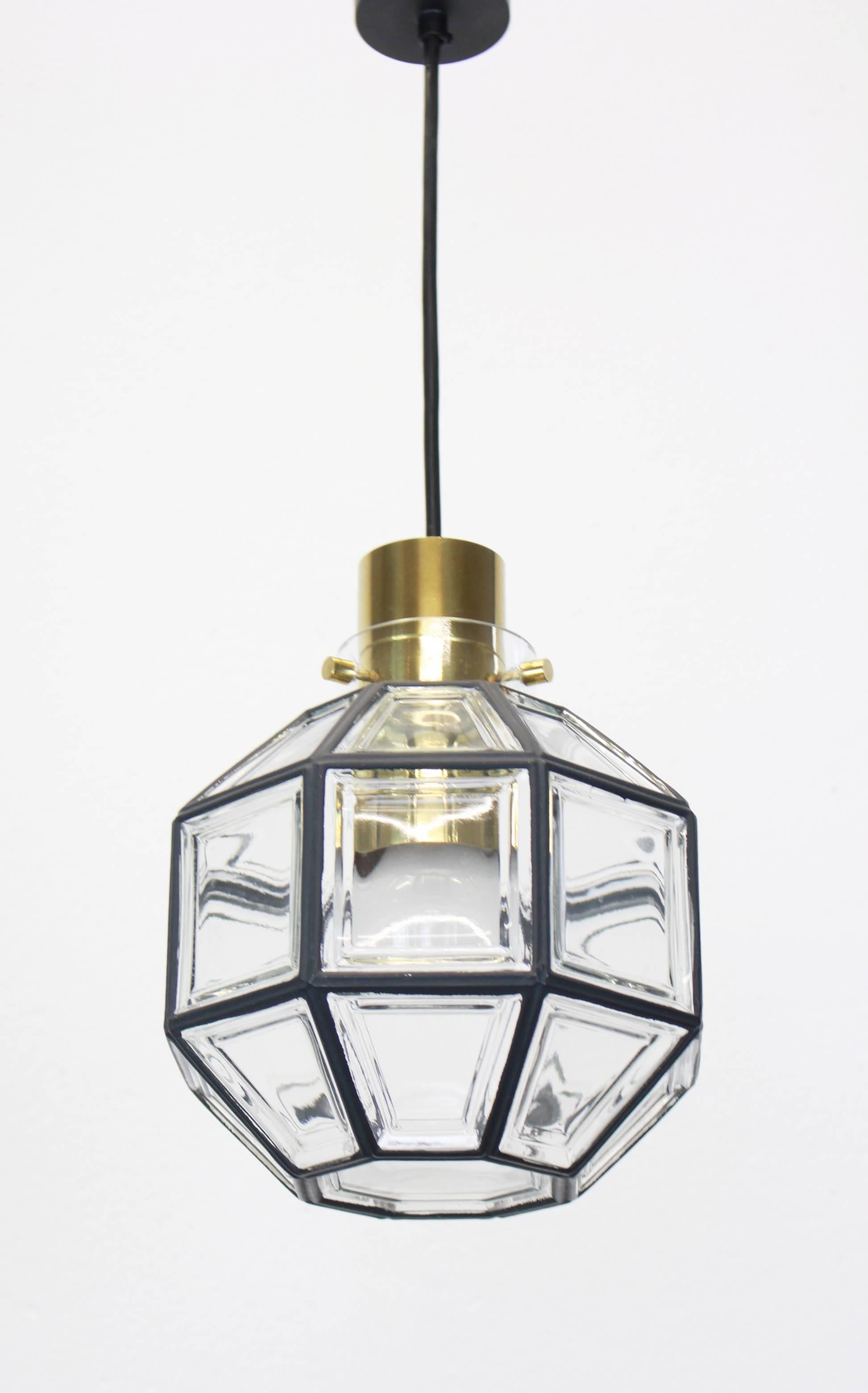 Set of four Minimalist iron and clear glass pendant lights manufactured by Limburg Glashütte, Germany, circa 1960-1969. Octagonal shaped lantern and multi-faceted clear glass.

Sockets: Each – One x E27 standard bulb.

Please note the price